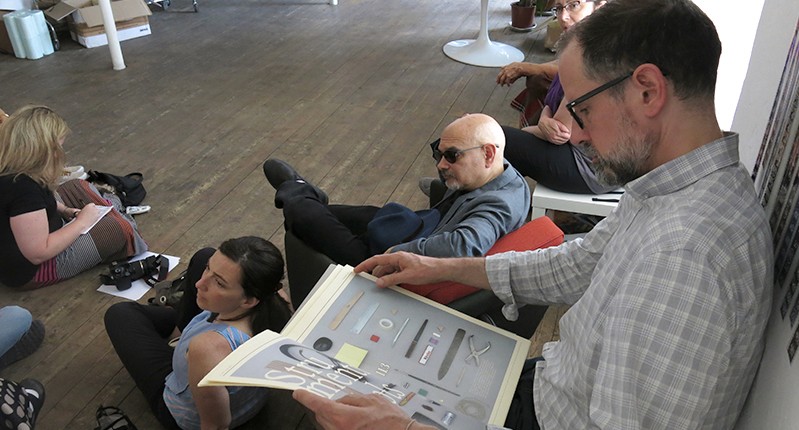 a man reading an article