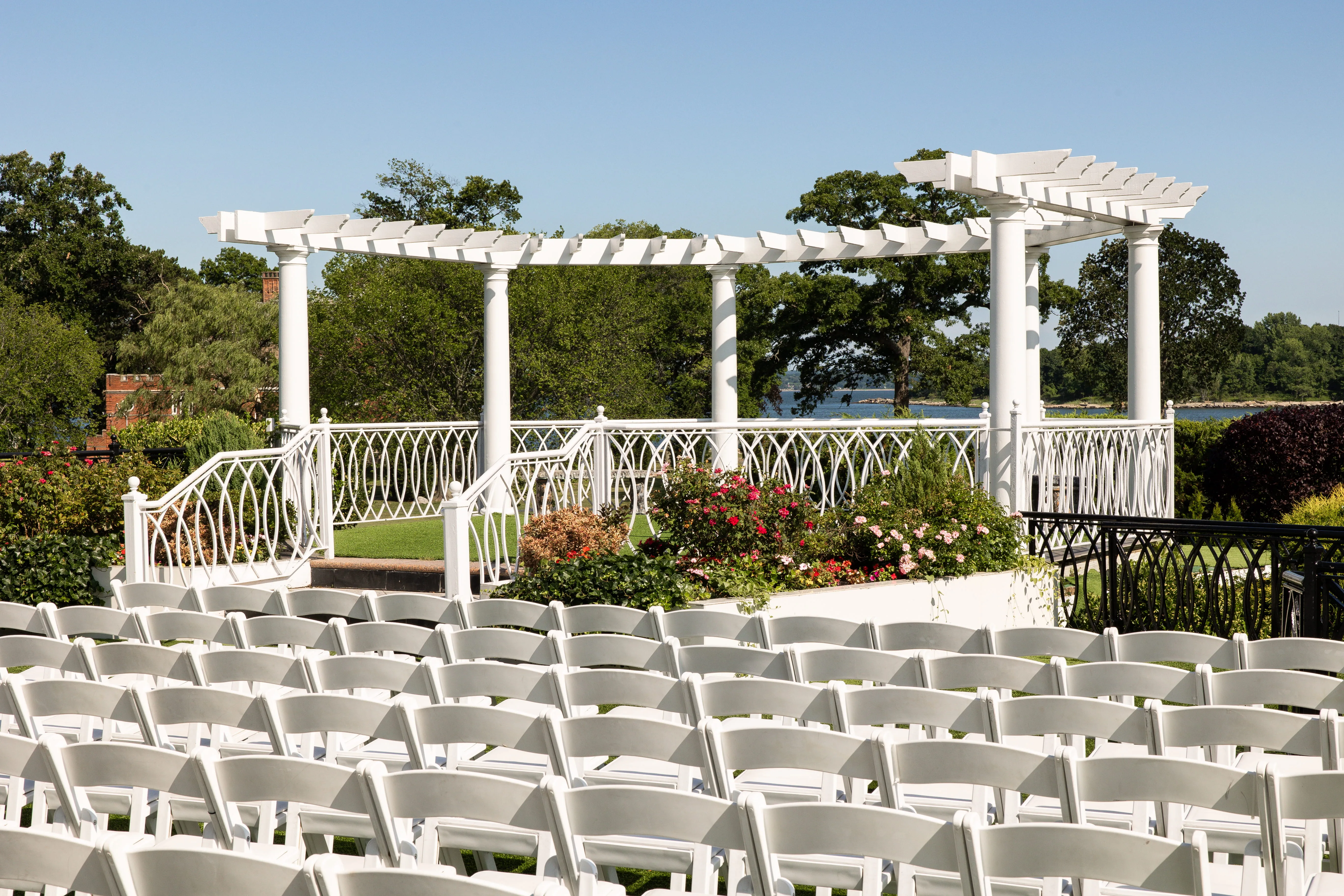 VIP Country Club outdoor waterfront ceremony setup in New Rochelle wedding venue