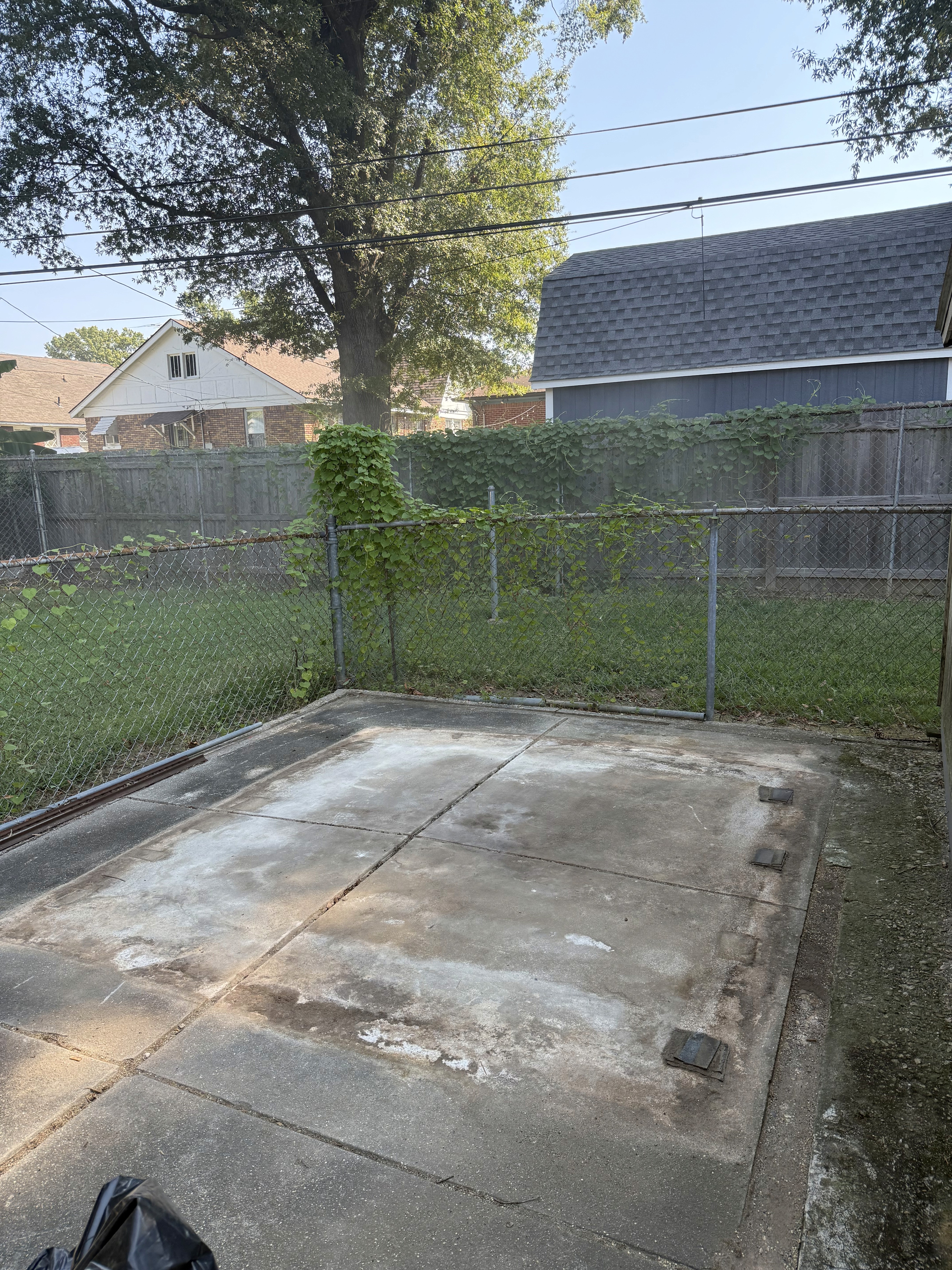 Cleared concrete pad after shed removal