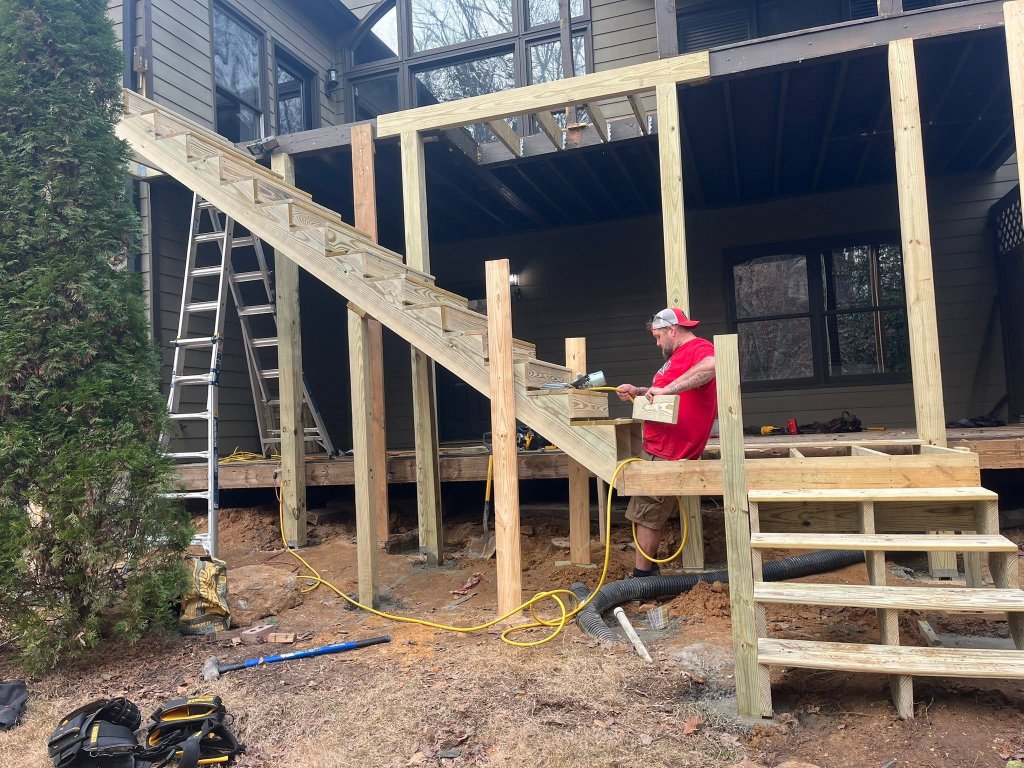 New Again Remodel crew working on a custom deck