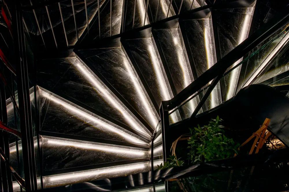 Marble spiral staircase outlined in light