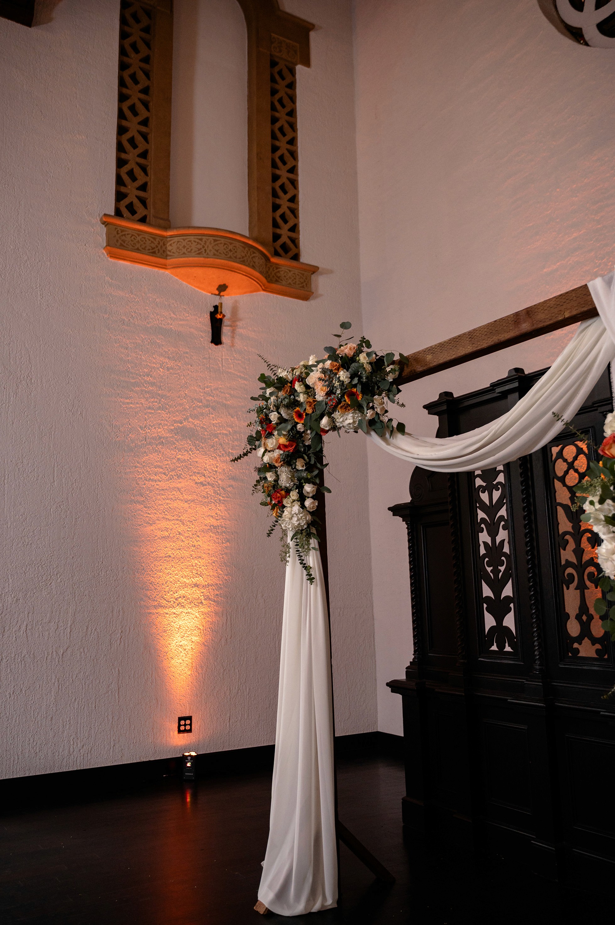 Flat lay wedding details with bouquet, rings, and sparkling bridal heels