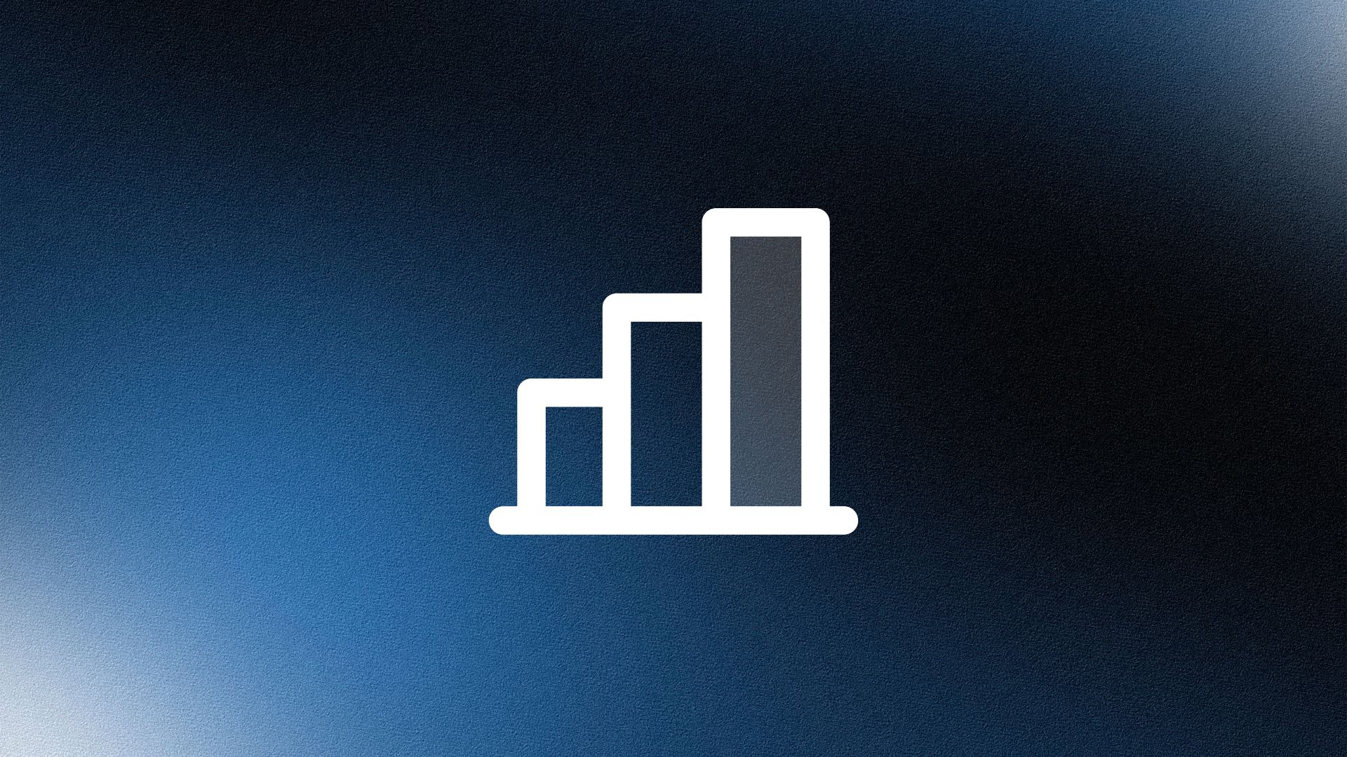 Smiling woman wearing a beige blazer and grey shirt, holding a folder while standing by a sunlit wall.