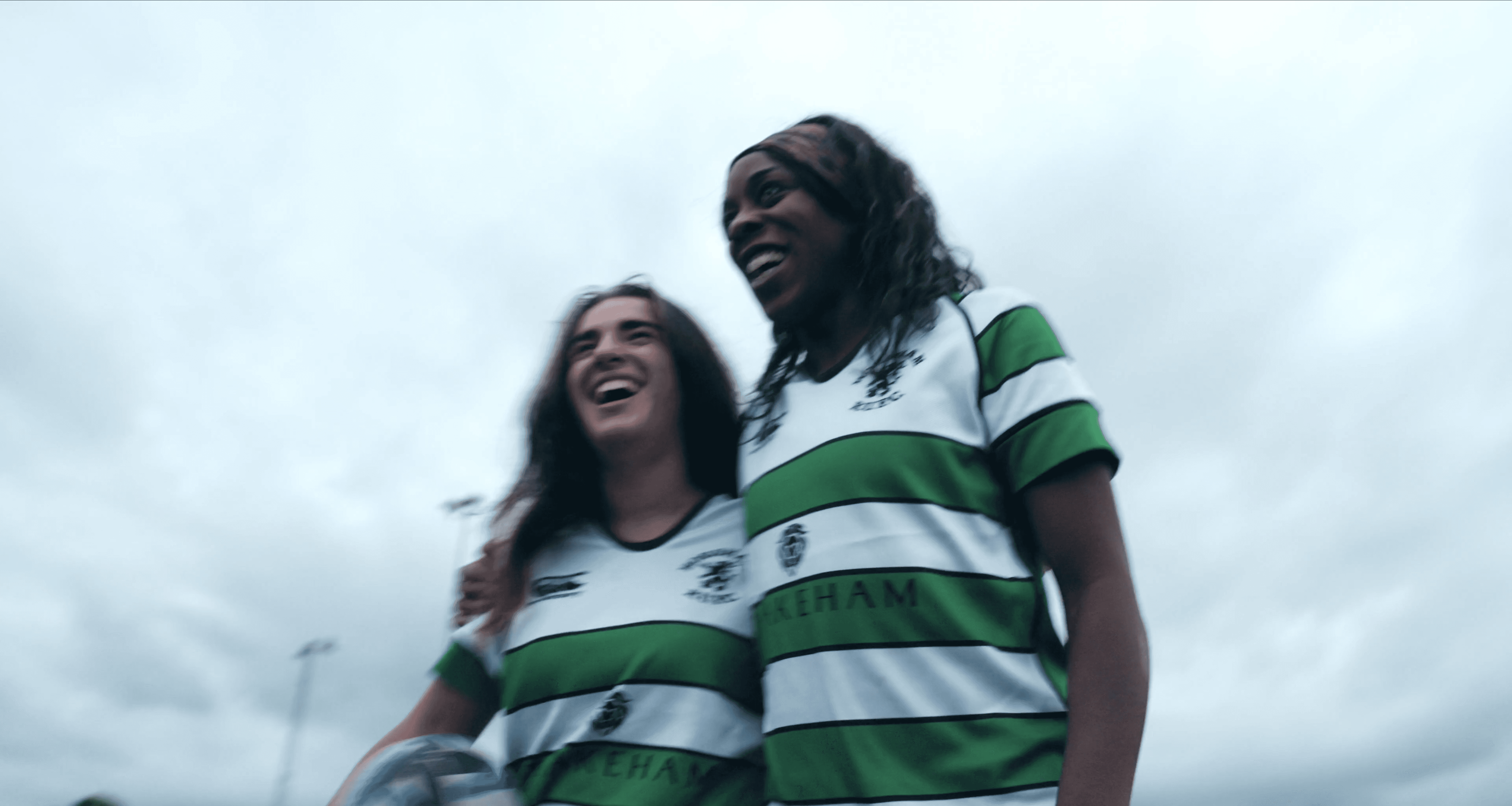 People using laptop and discusing