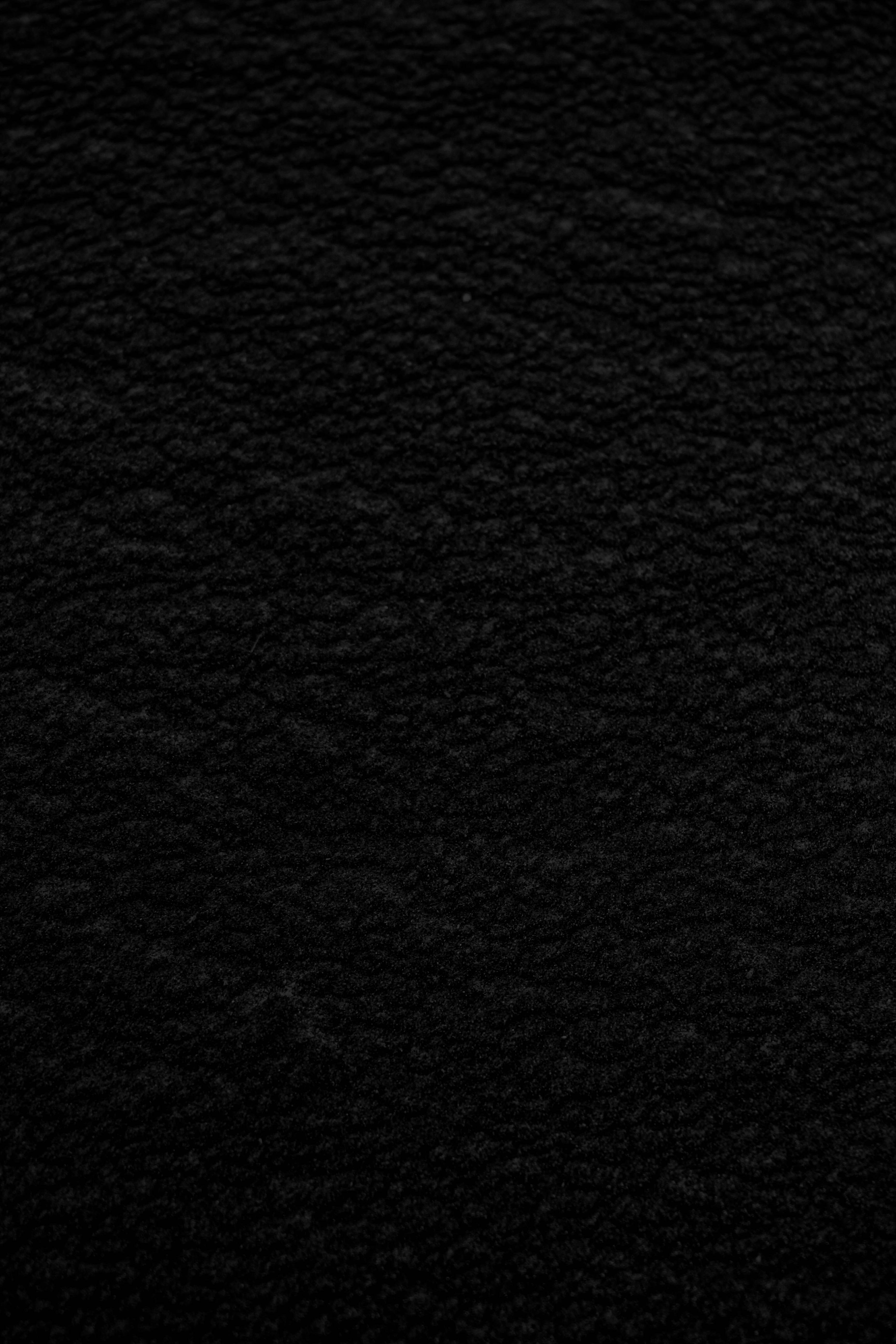 black textile in close up photography