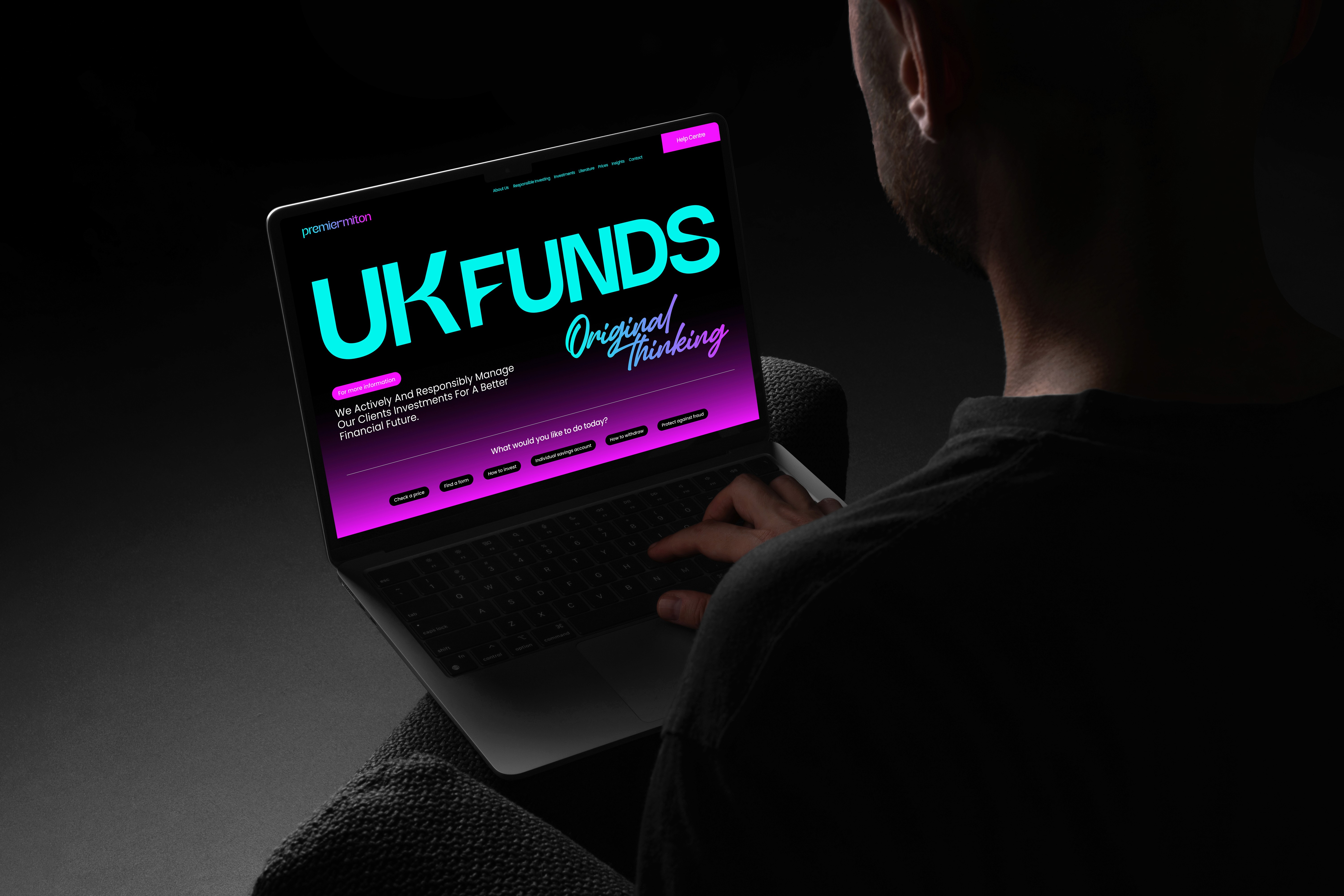 Man holing iPad showcasing Premier Miton web design concept screen.