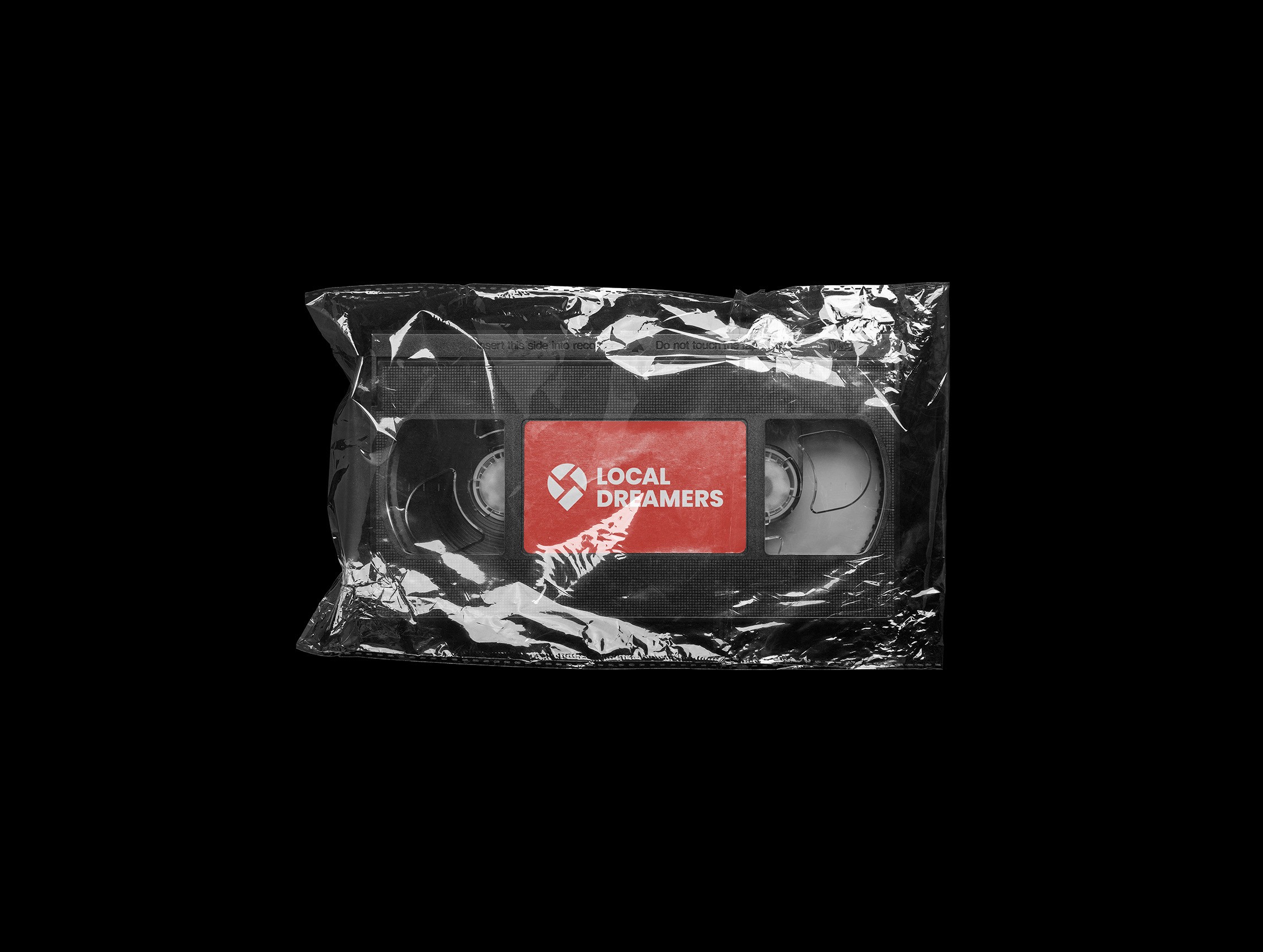 Zdjęcie kasety magnetofonowej z nadrukowanym logo Local Dreamers