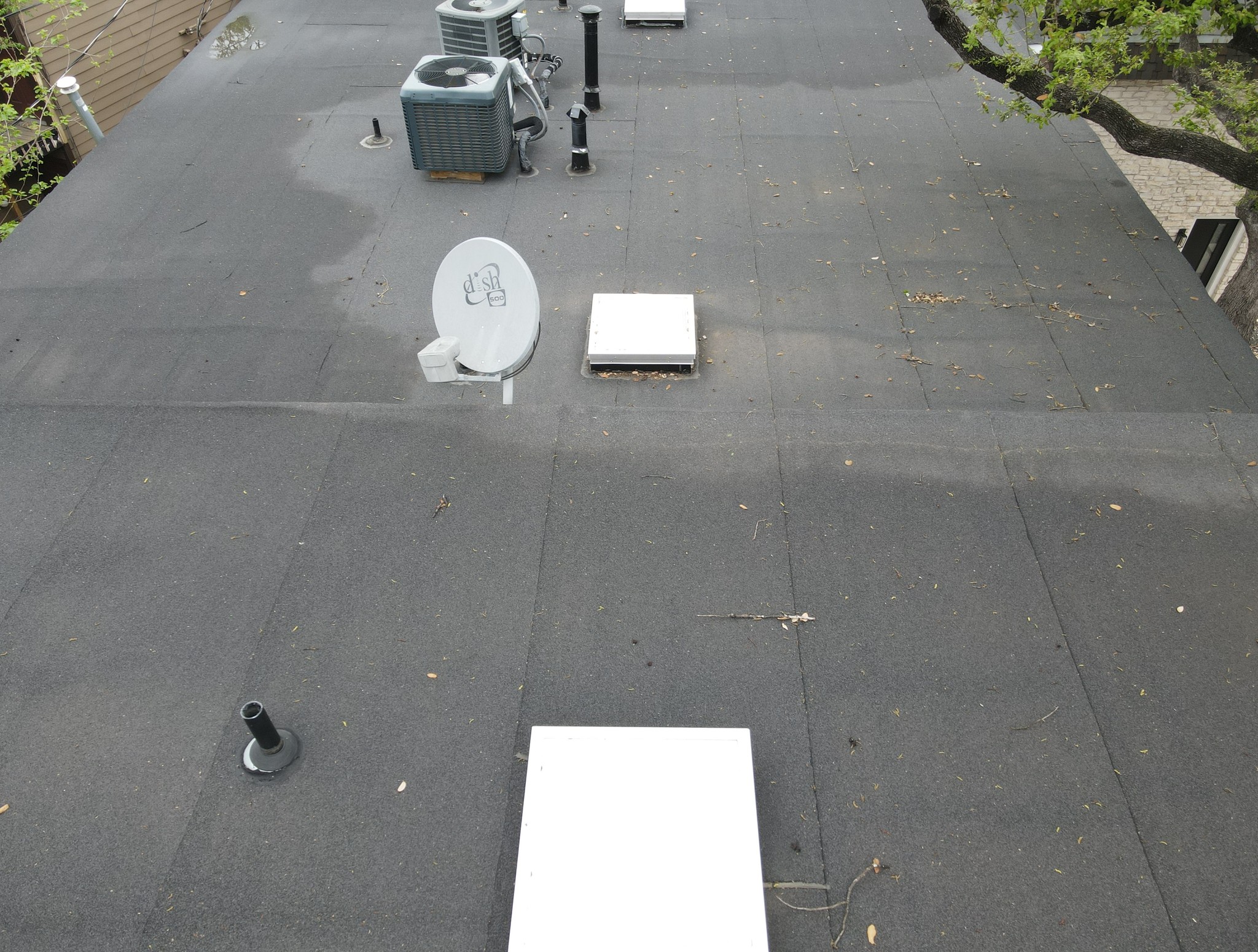 Skylights on a new modified bitumen flat roof in austin texas. 