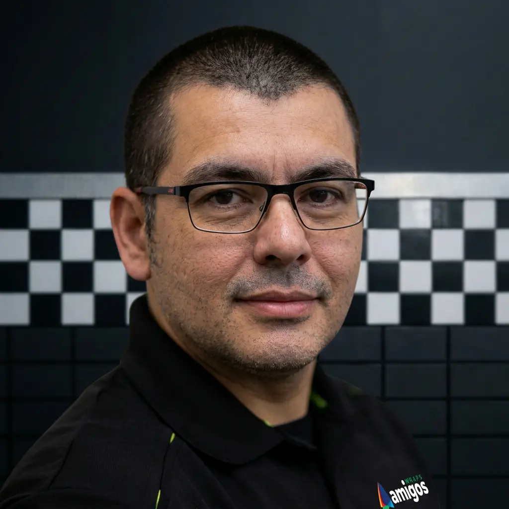 Man with glasses and short hair, black shirt