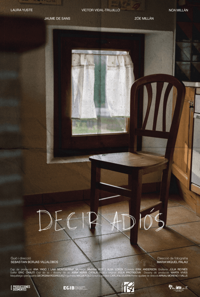 Woman in a light suit sitting thoughtfully against a terracotta wall