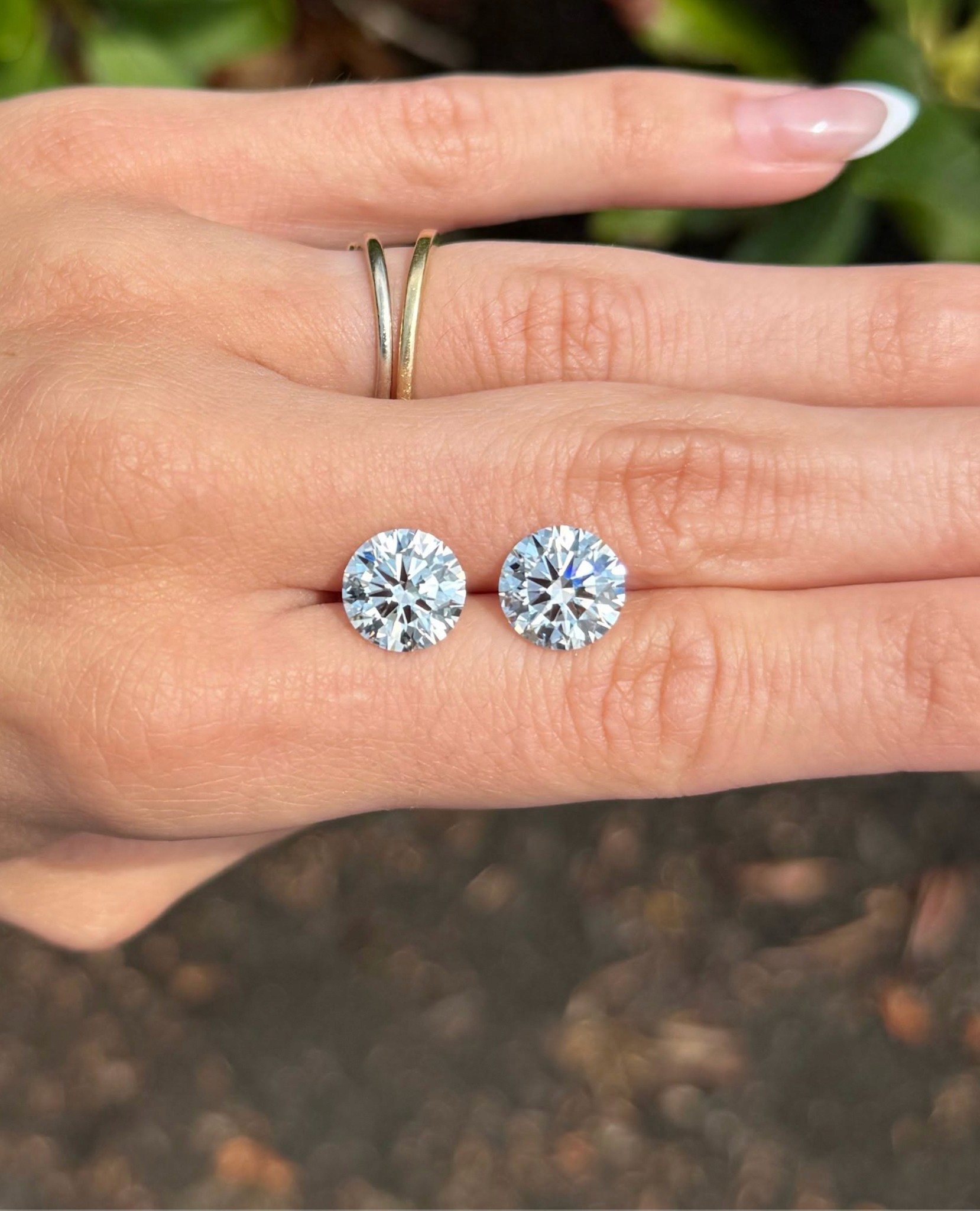 Certified lab-grown diamonds with certificates during Bangkok gem fair sourcing.