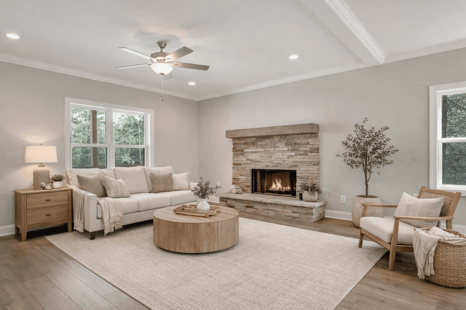 Open concept kitchen and living room with vaulted ceilings and hardwood floors