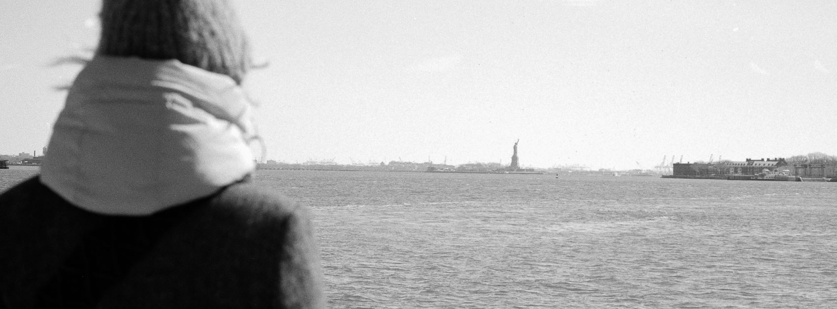 Photographing shadows on film: NYC with the statue of liberty in the background. All details are preserved