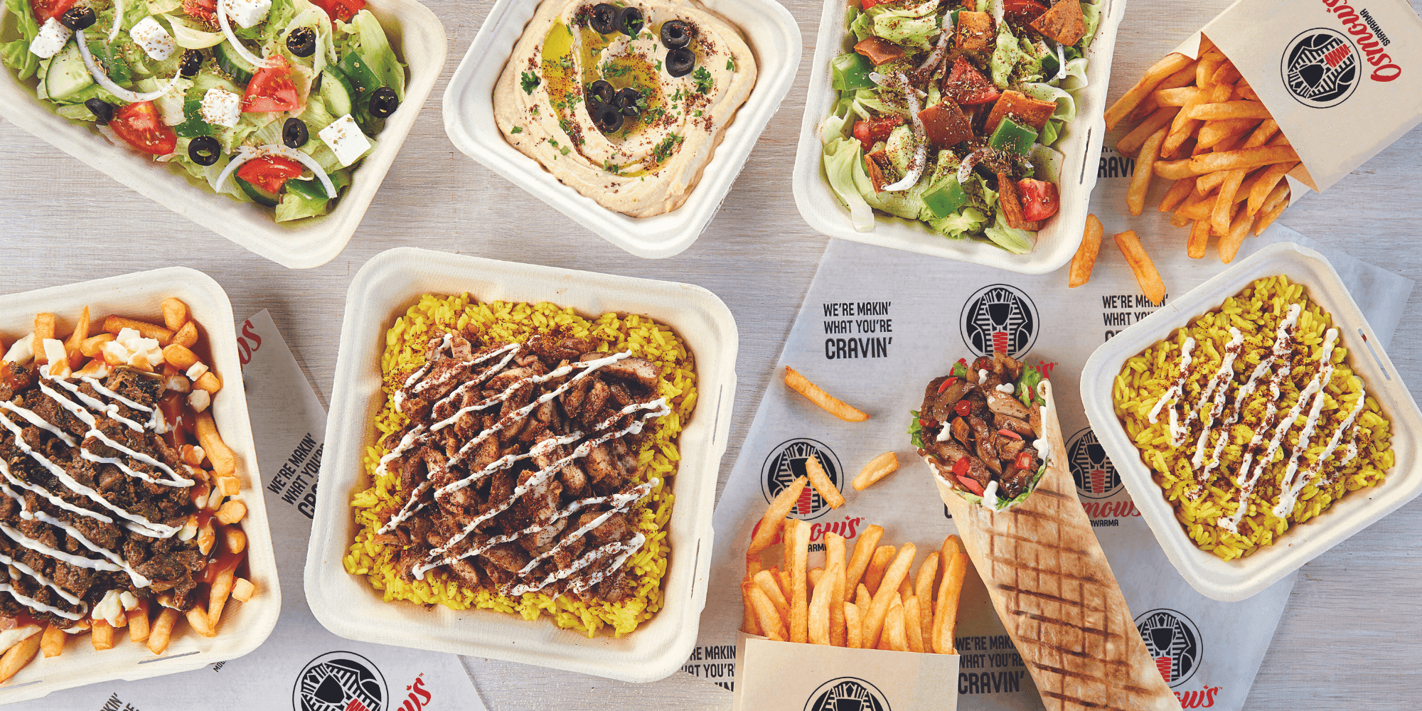 Osmow's menu hero image with shawarma trays, fries and fresh toppings — your go-to shawarma spot