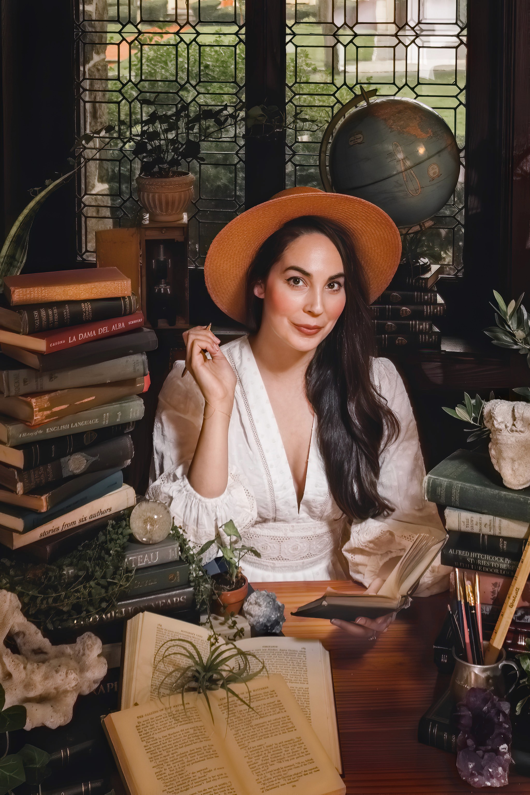 Portrait of Eva Grall surrounded by books.
