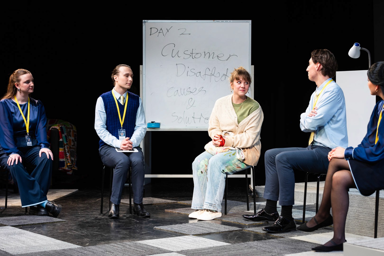 Trix, The Aviatrix surrounded by cloud dancers in a makeshift cardboard plane