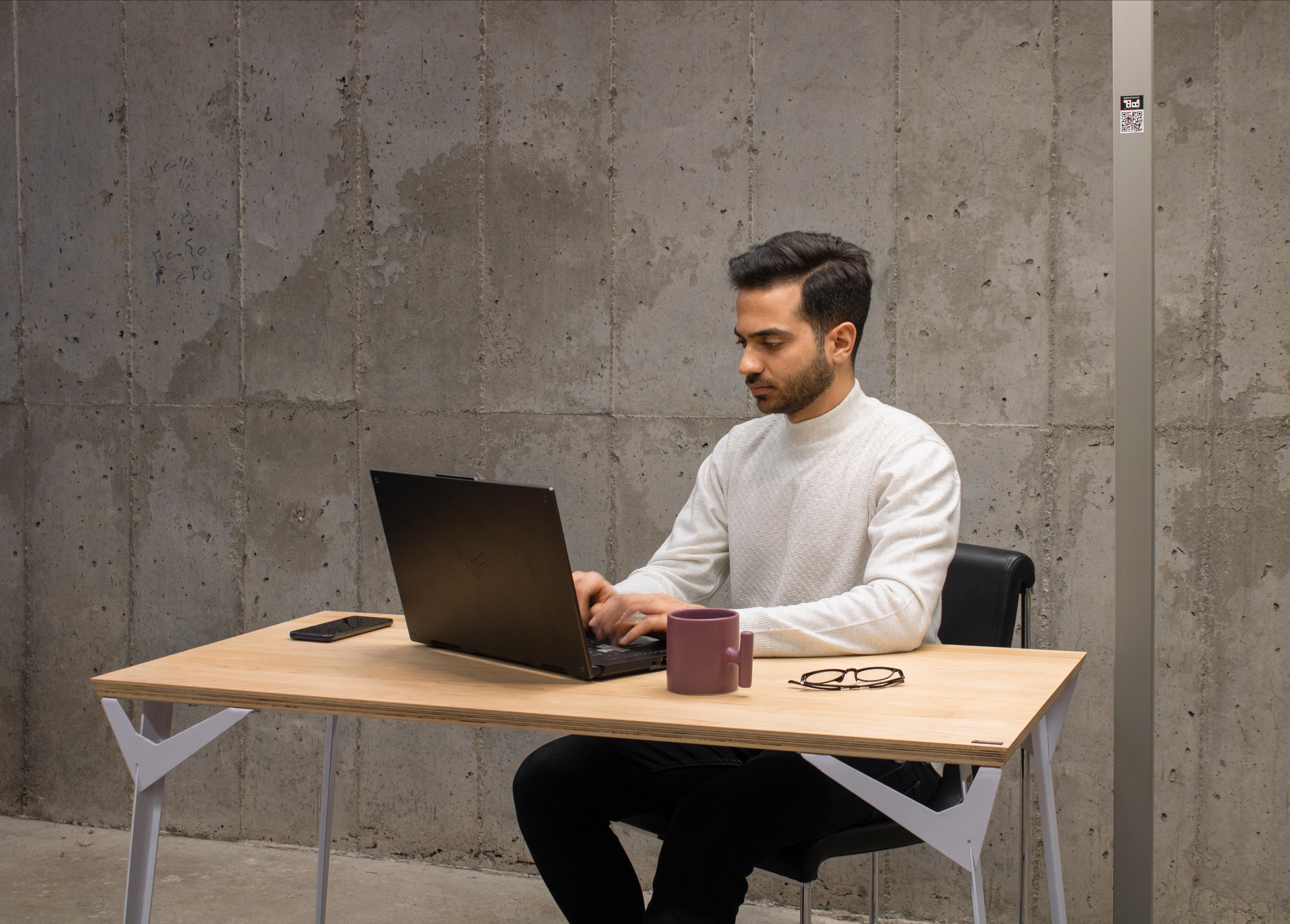 person working on laptop - Shopify Cookie Popup