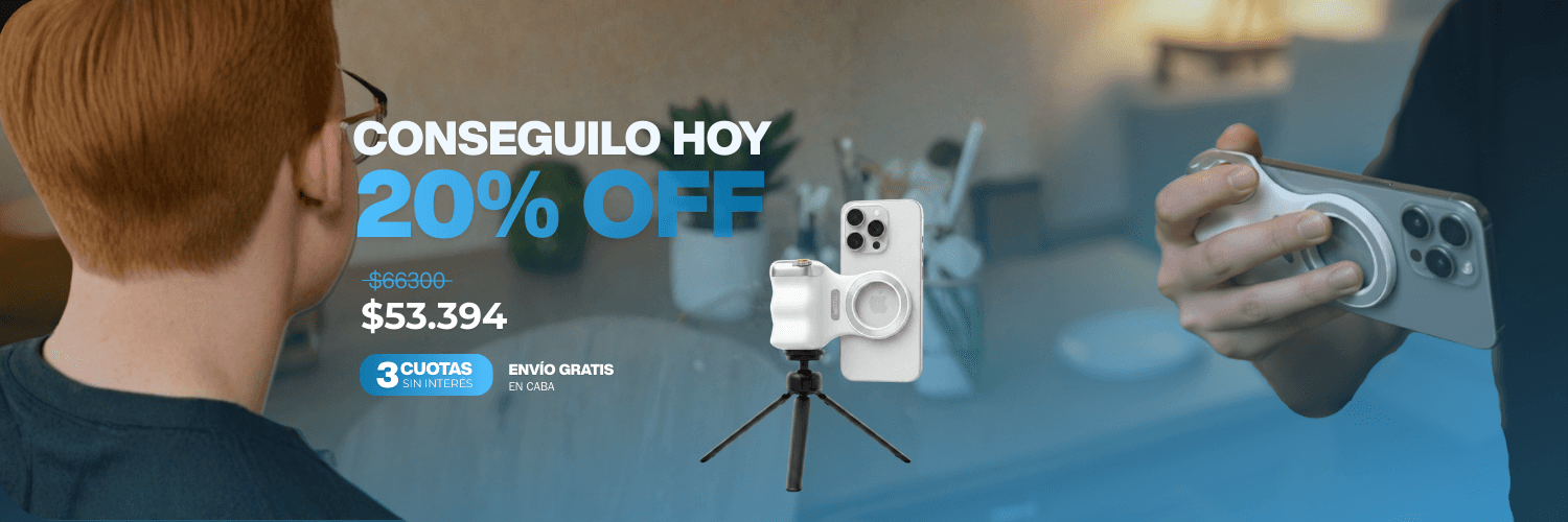 Athletic man in a sleeveless black outfit posing confidently outdoors under a bright blue sky, with a close-up of navy and salmon-colored men’s running shoes in the foreground.