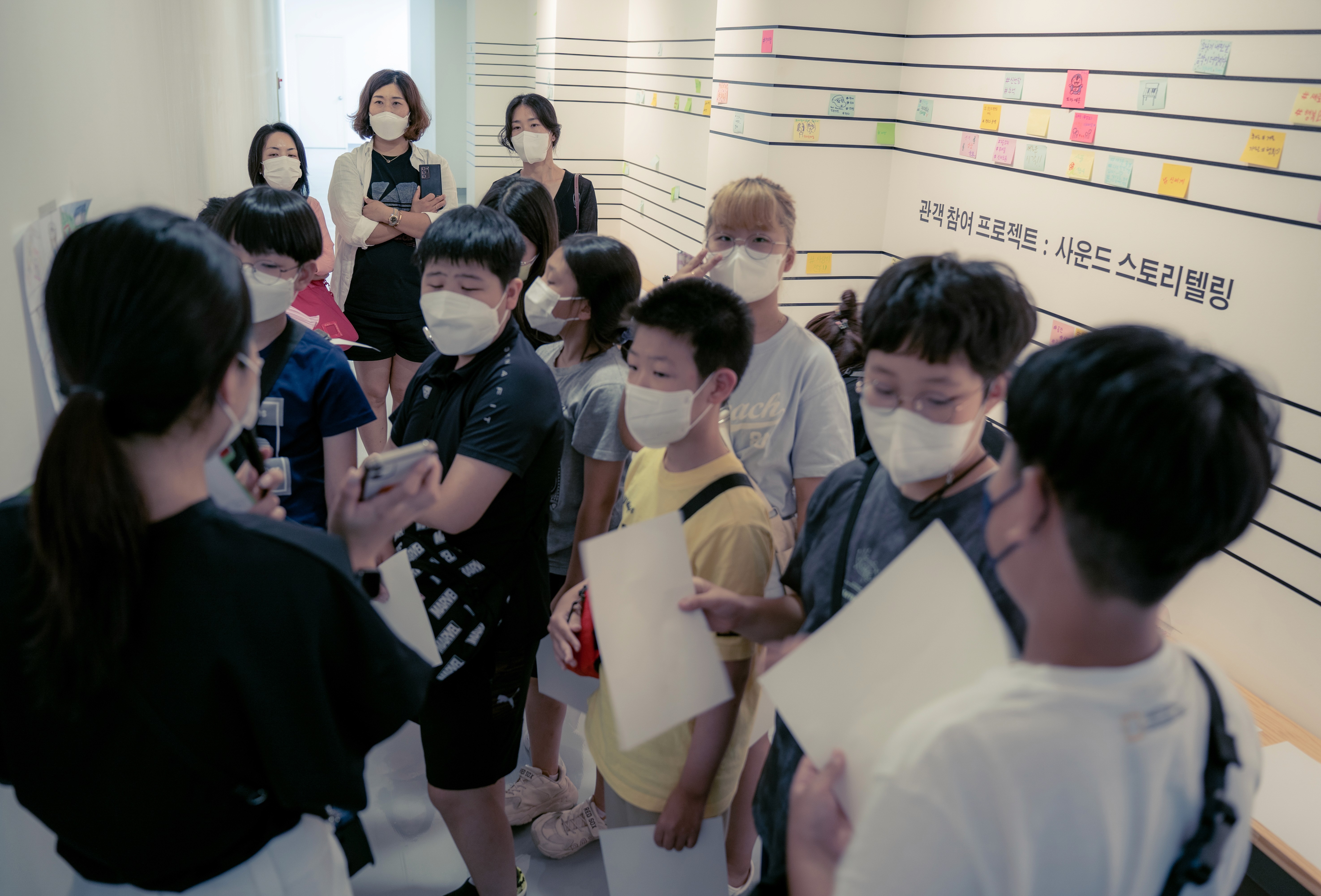 Art supplies and pencil on paper sheet