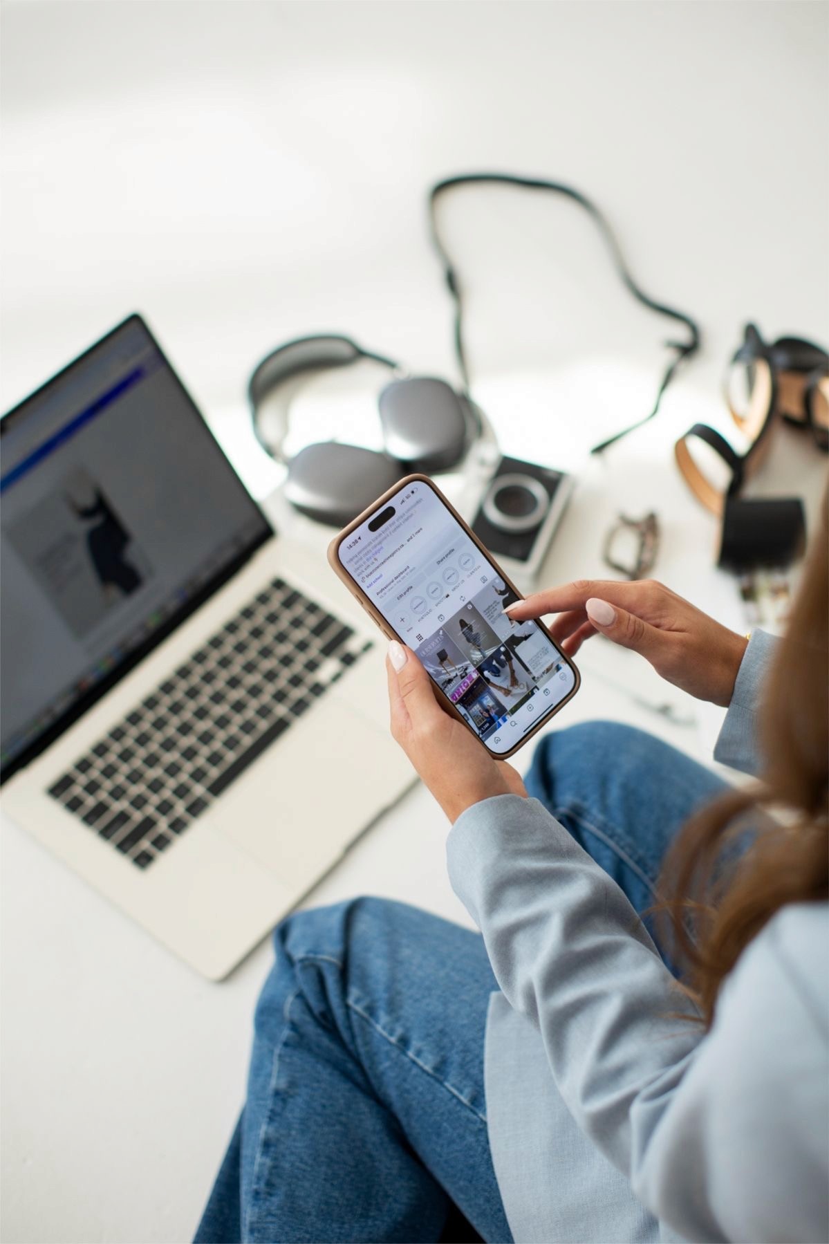 Woman in a beige turtleneck by an old computer and TV, retro 80s office portrait.