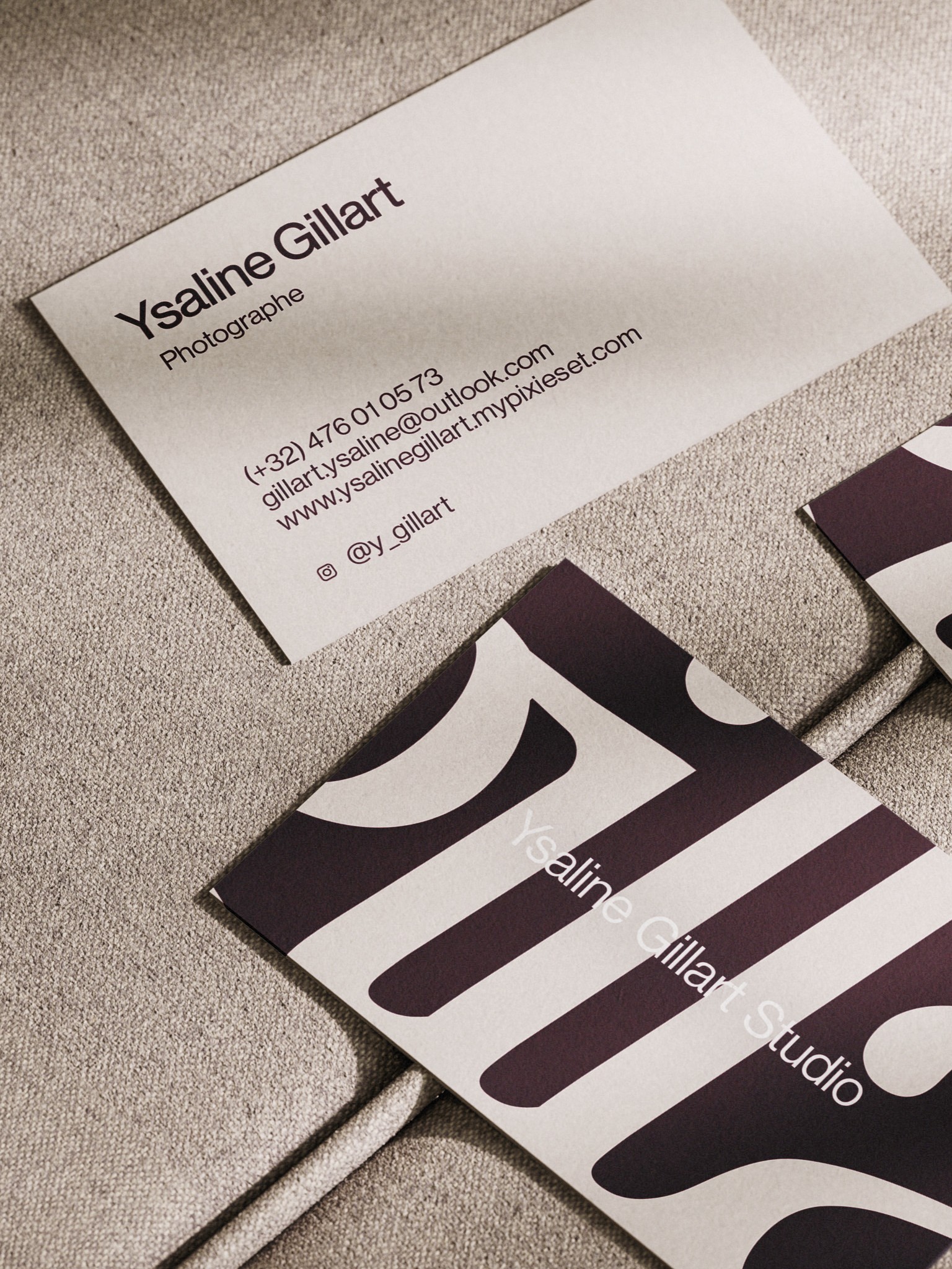 Modern home office setup with a monitor, ergonomic chair, keyboard, and indoor plants near a window with blinds.