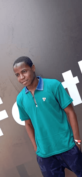 A man in a suit smiling