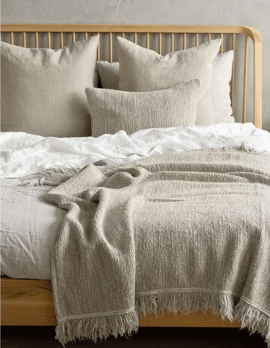 white ceramic mug on brown wooden table