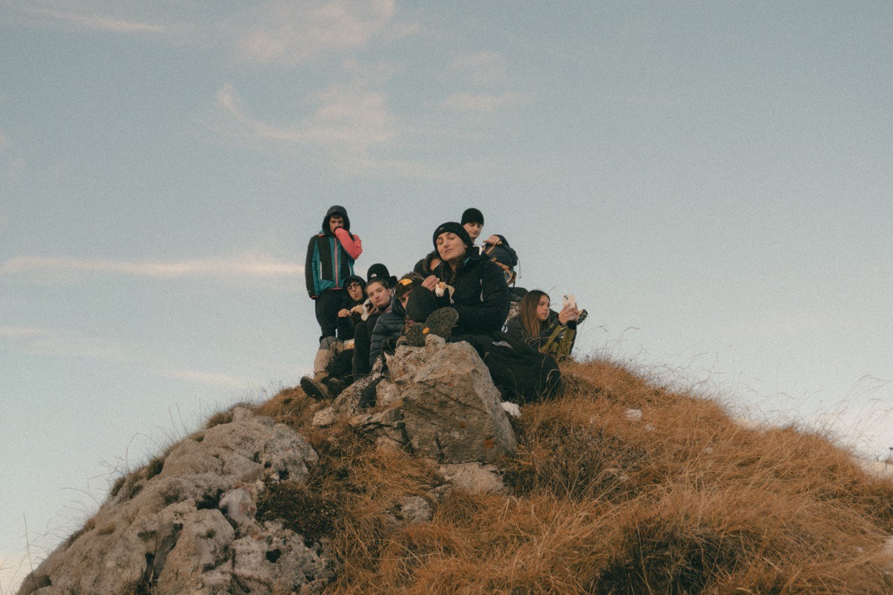 Group of hikers on top of a mountain