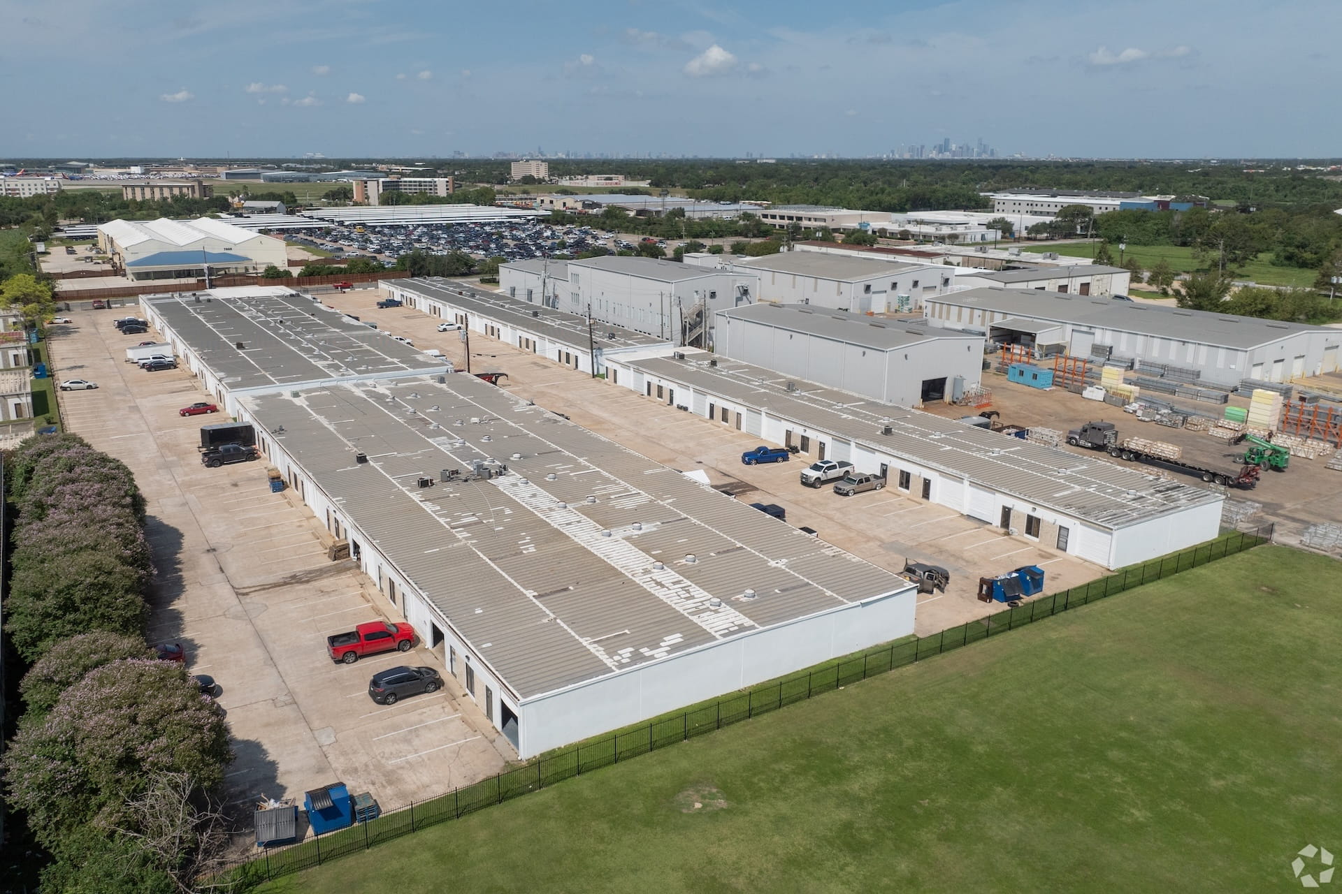 a living room filled with furniture and a large window
