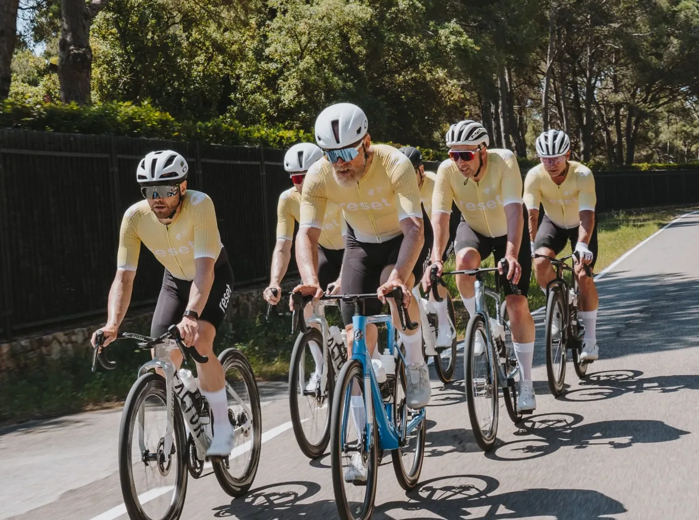 The reset cc team riding together at the Girona camp