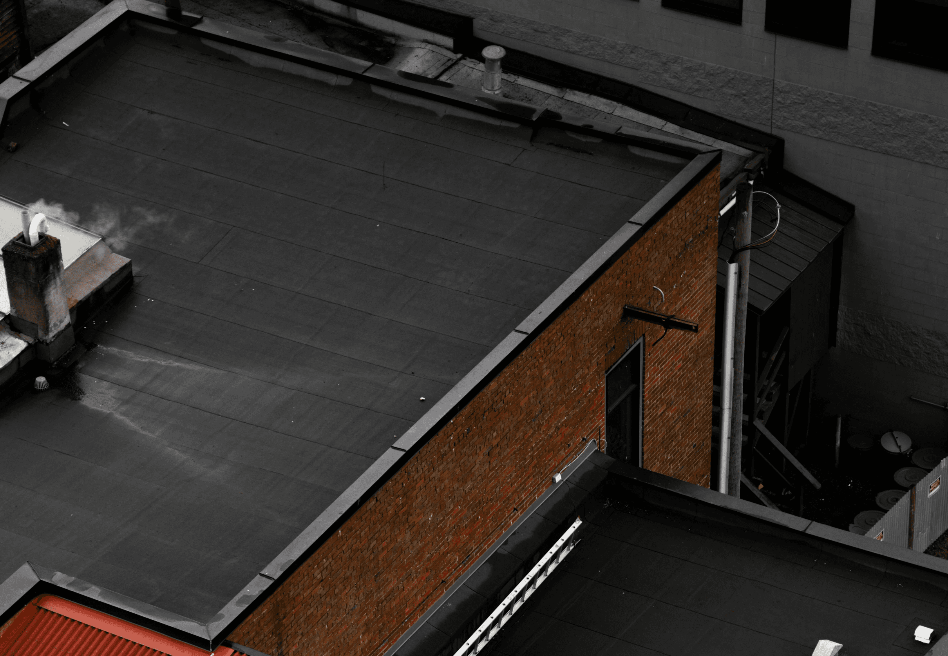 a close up of a rain gutter on a roof