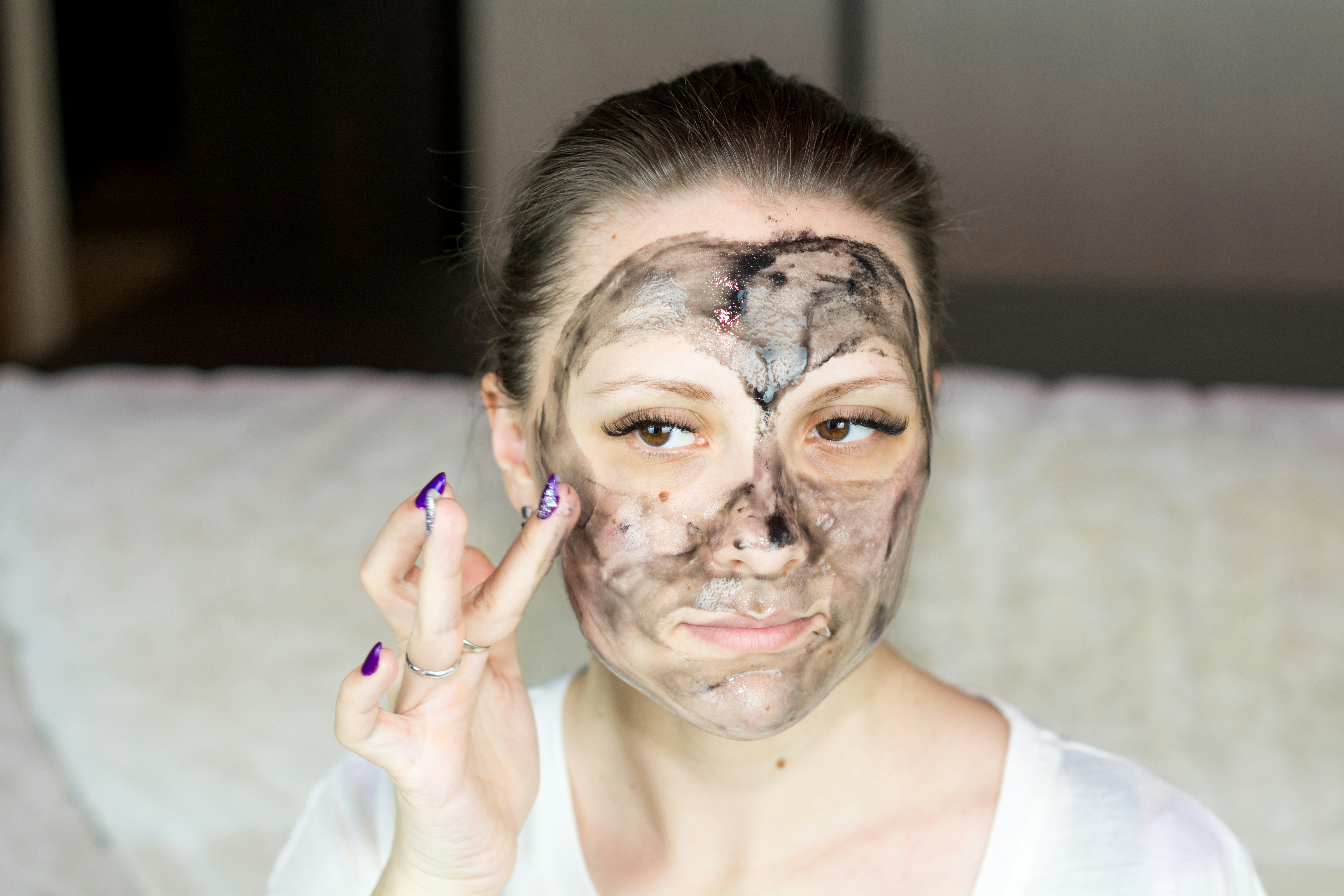 woman applying product - Skincare For Combination Skin