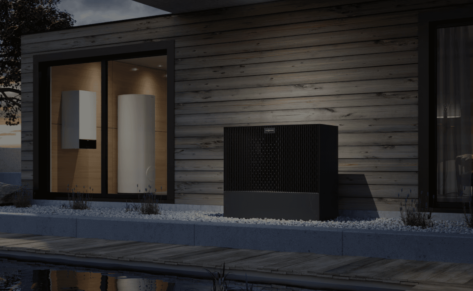Moderne Luft-Wasser-Wärmepumpe mit Inneneinheit und integriertem Warmwasserspeicher im Einfamilienhaus – effiziente Heizlösung mit Buderus Wärmepumpensystem für nachhaltiges Heizen.