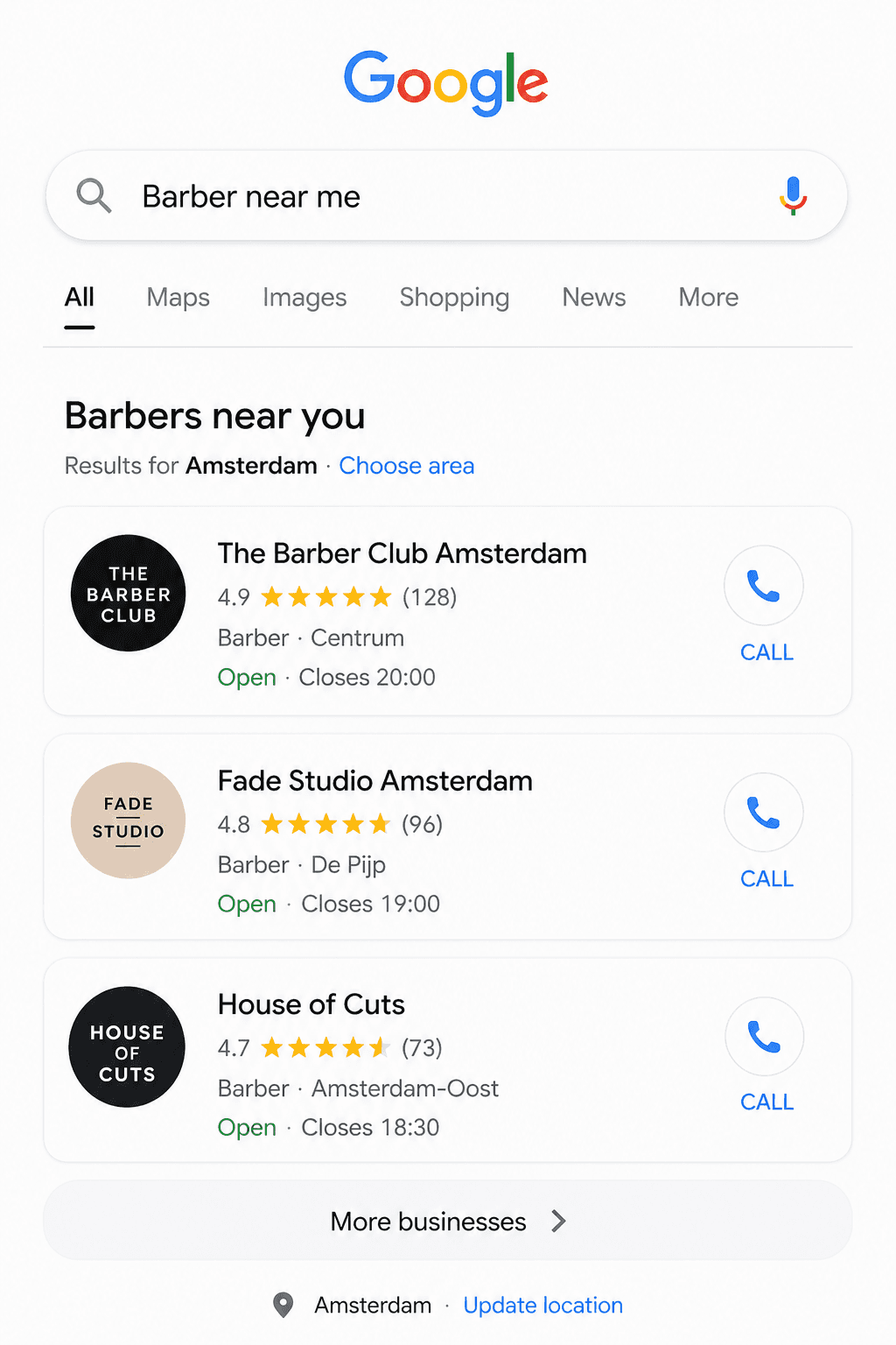 A smiling young man with crossed arms, wearing a plaid shirt and white t-shirt, poses against a dark background.