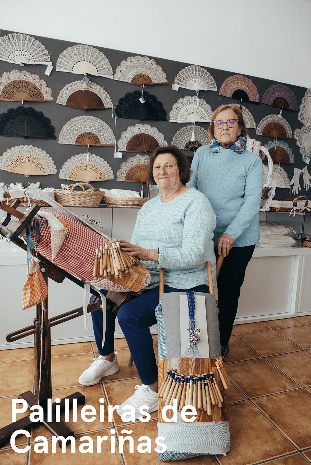 Women from the Camariñas Lace Makers Association posing with lace fans
