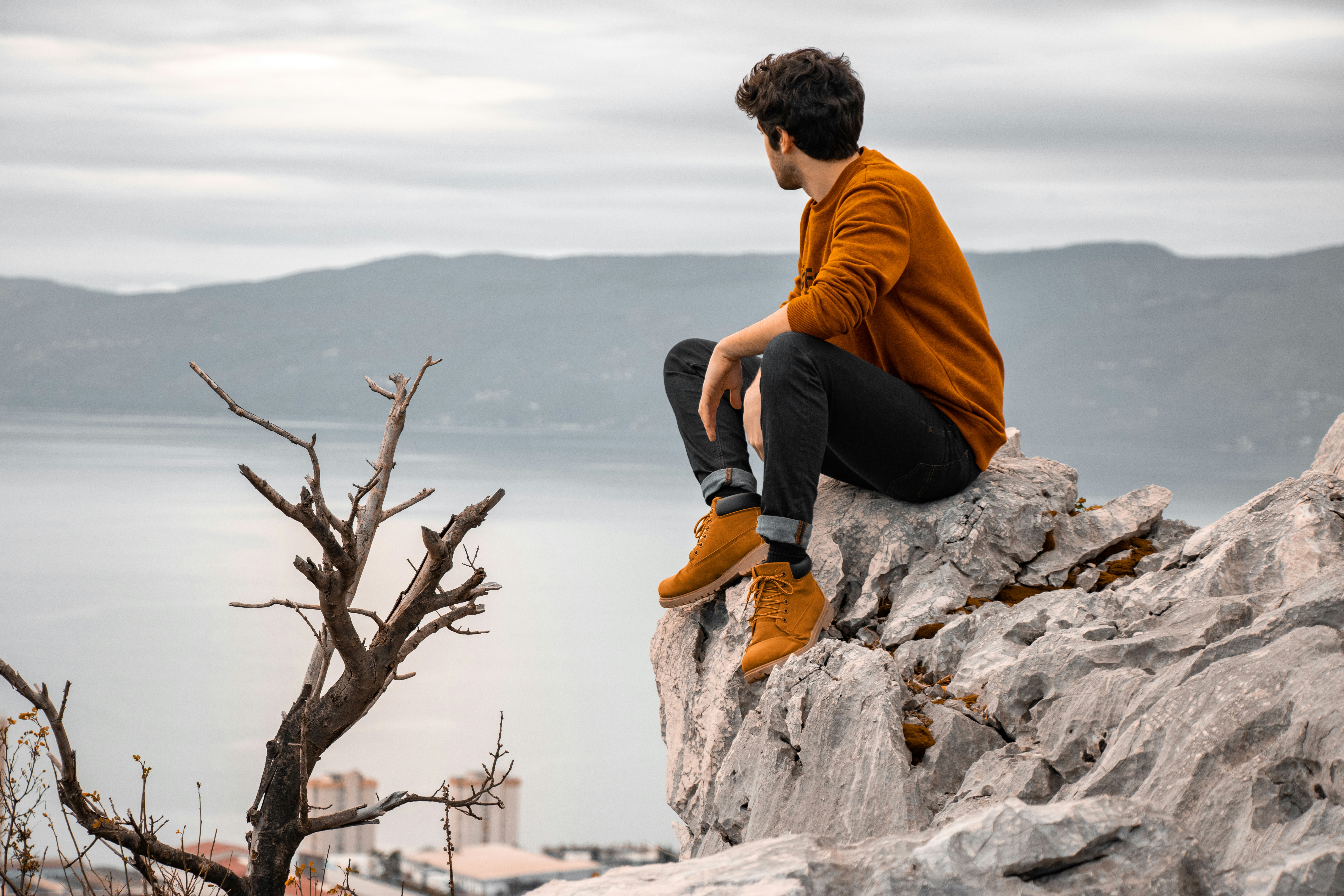 man on a mountain - Casual Fall Outfits