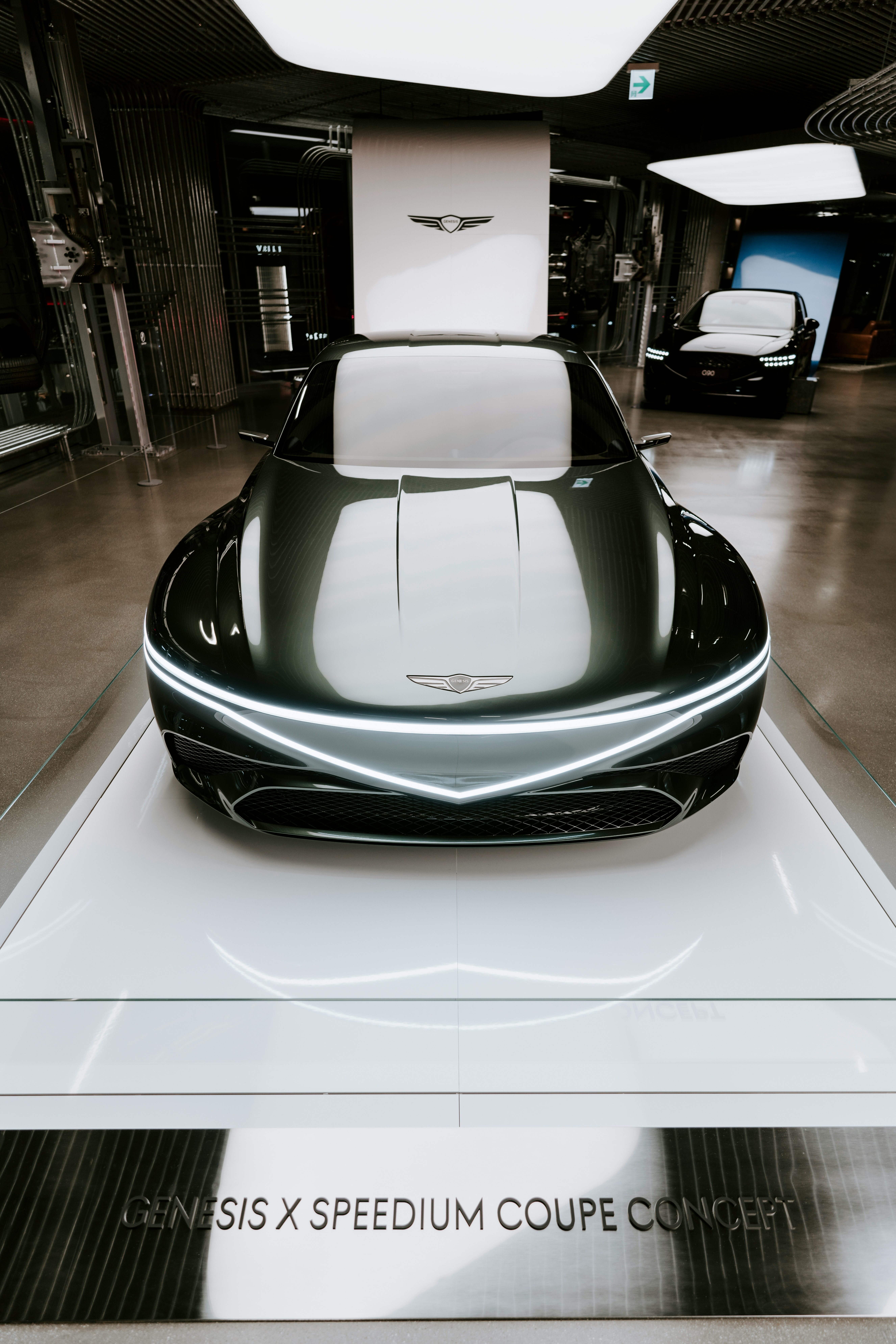 A futuristic car on display in a showroom