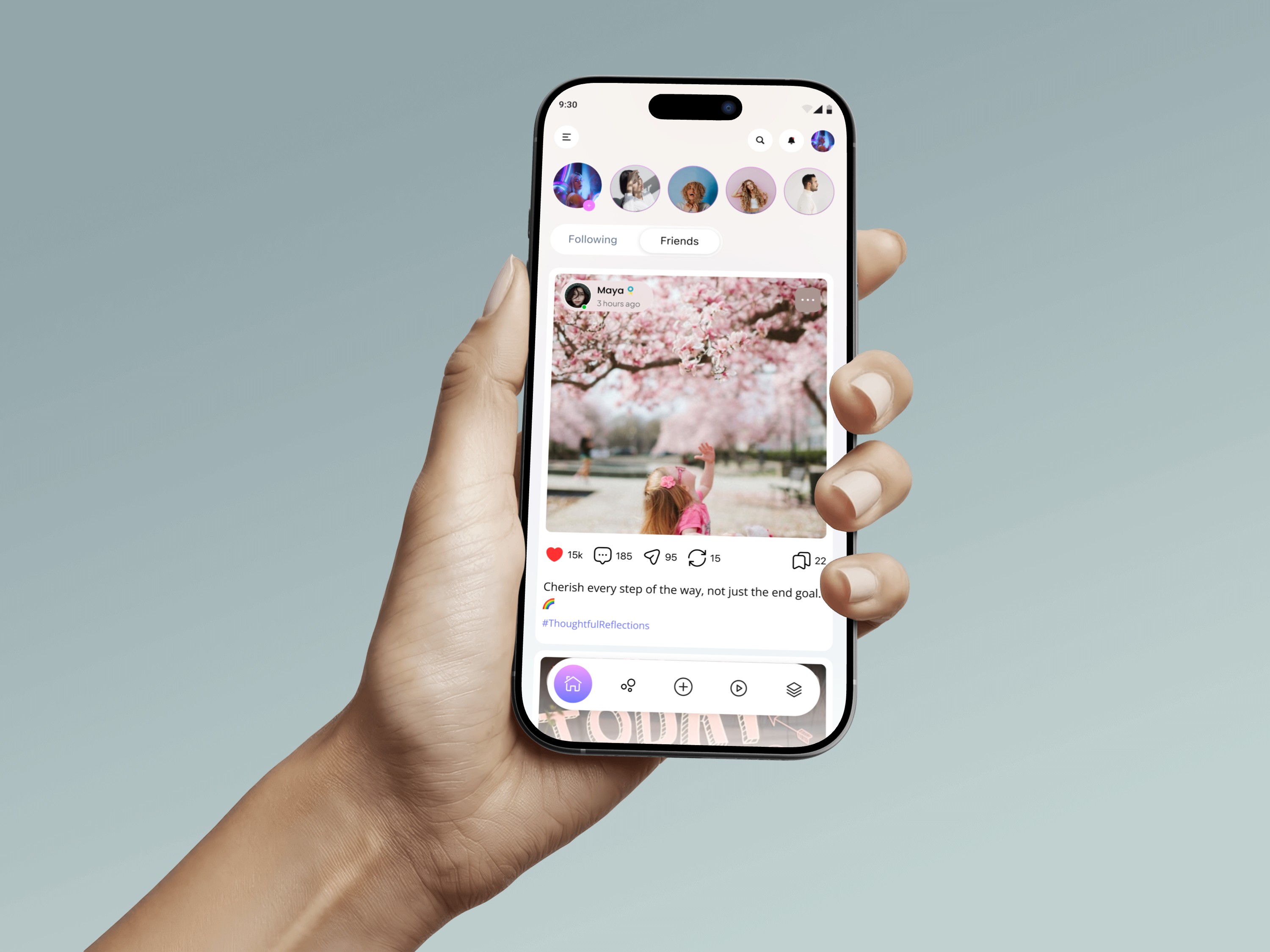 Man smiling while looking at his smartphone at his phone.