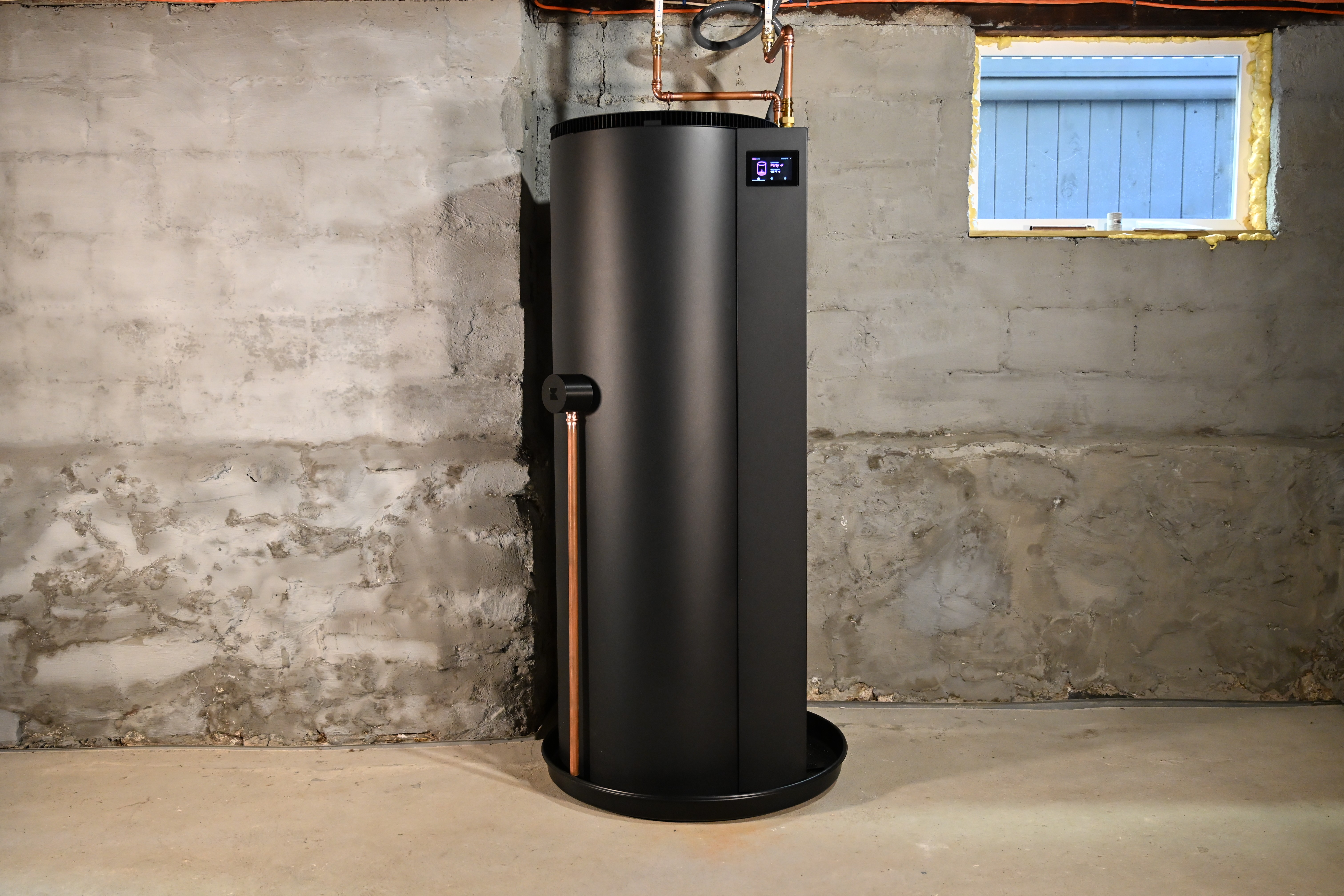 Reservoir water heater in basement