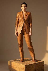 a woman standing on a cube