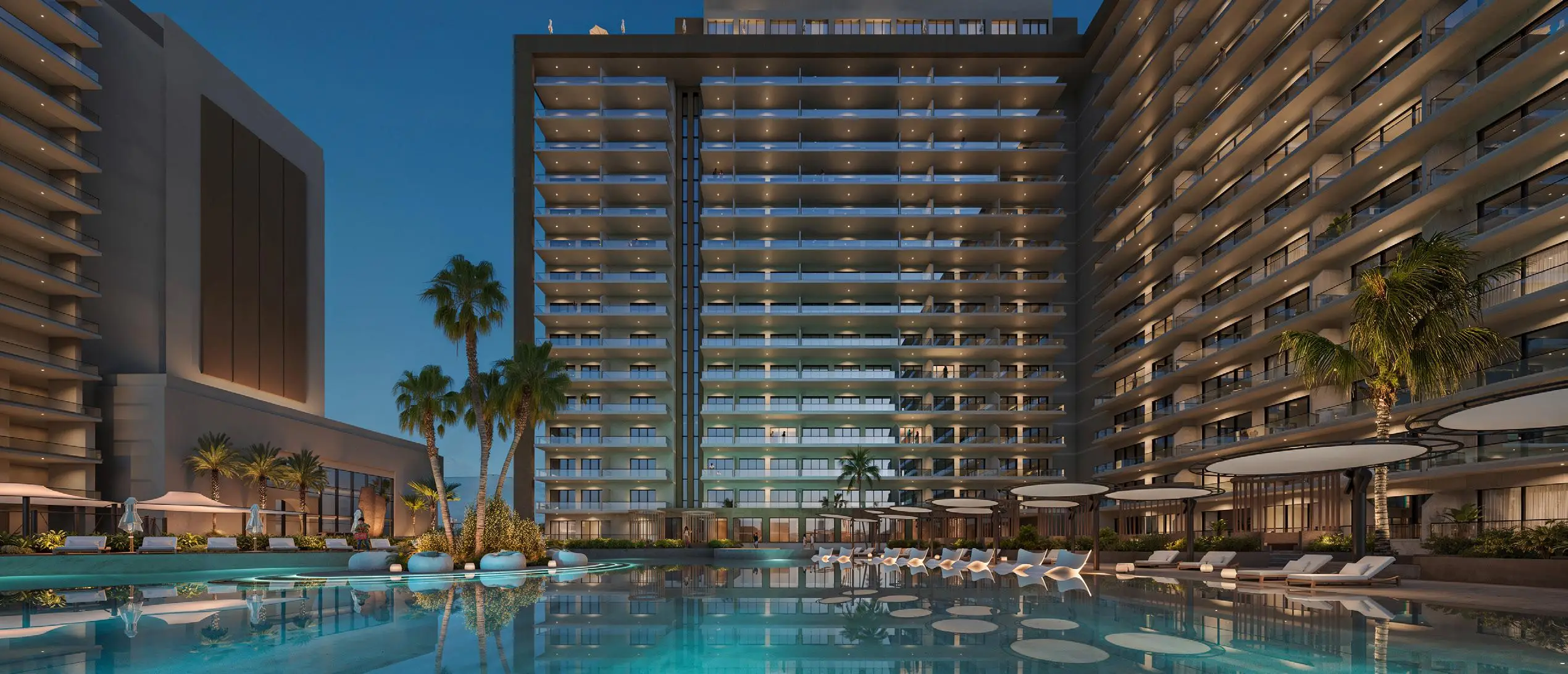 A pool surrounded by tall buildings and palm trees, set in the Oceana area, showcasing a vibrant urban oasis.