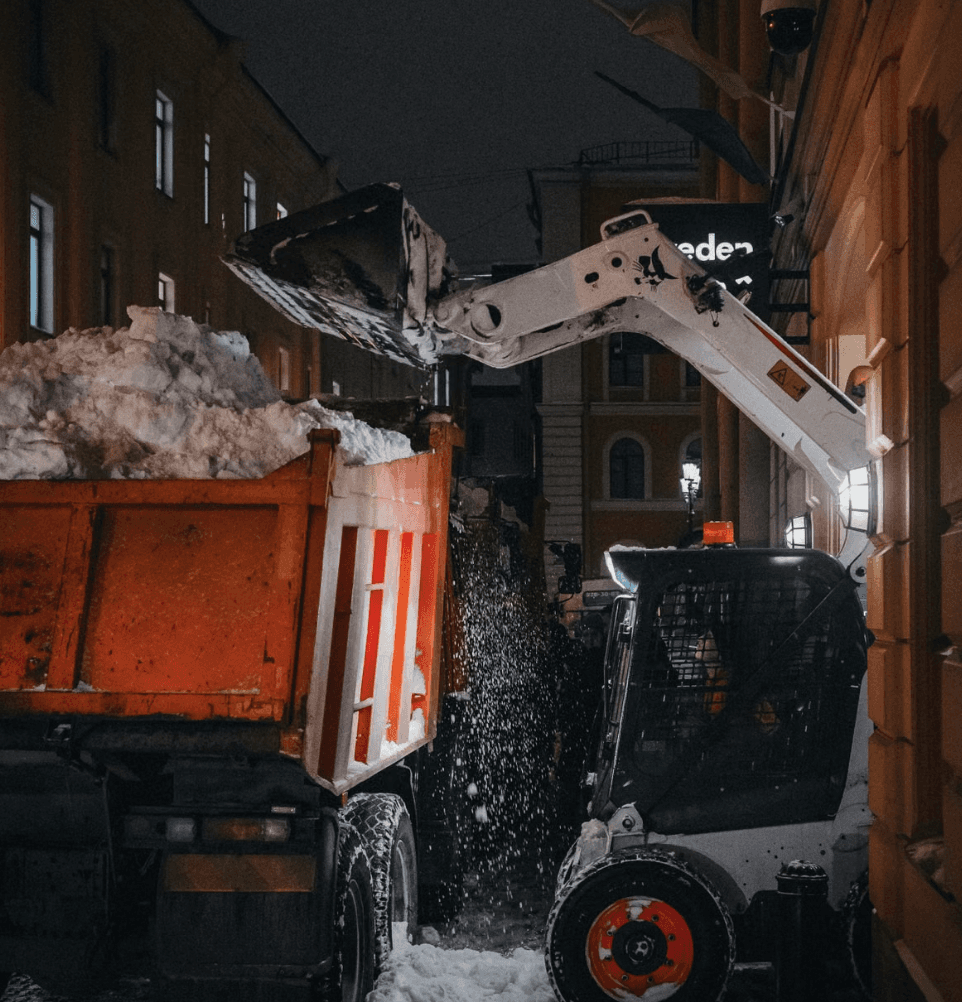 Commercial snow removal equipment on site