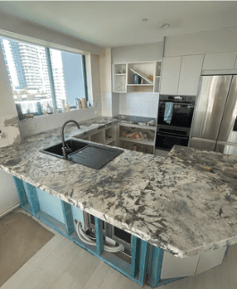 Glacier White stone U-shaped kitchen in Surfers Paradise
