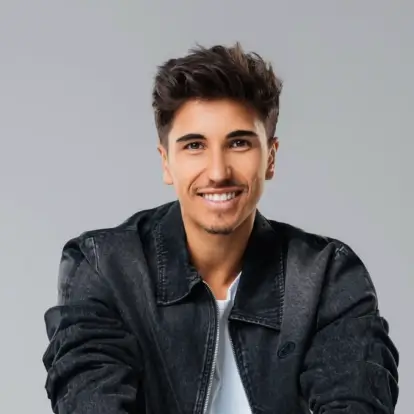 A smiling man in an outdoor landscape