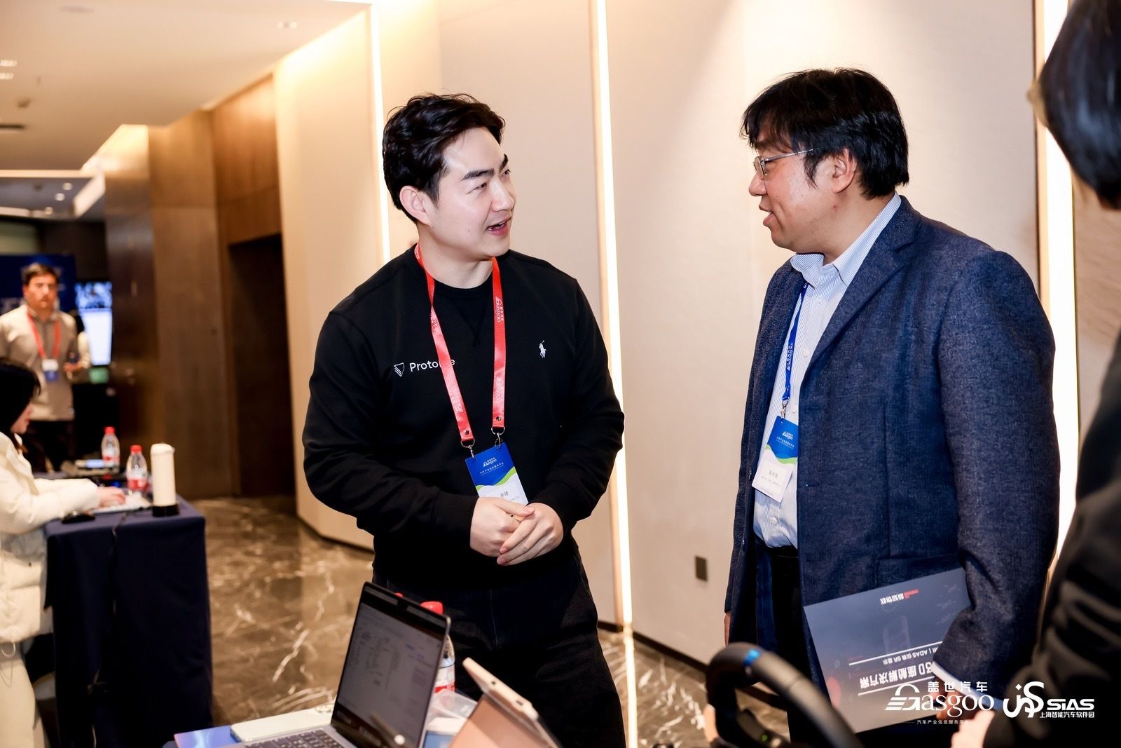 Link Li talking to After Sales System lead at General Motors