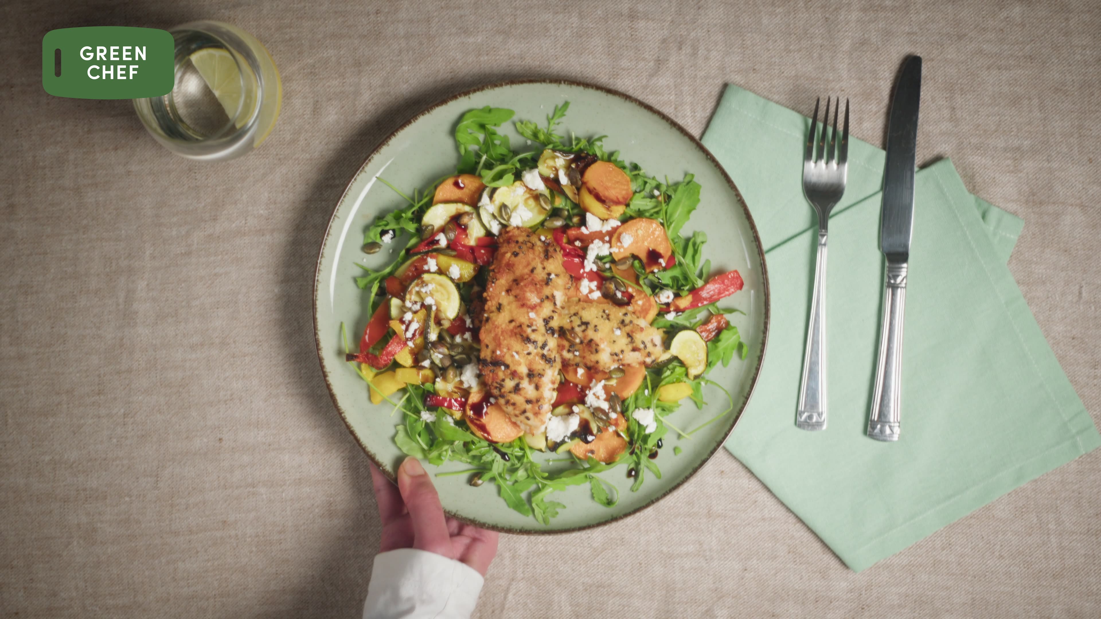The image captures the ethereal beauty of an underwater cave illuminated by sunbeams penetrating through an opening above.