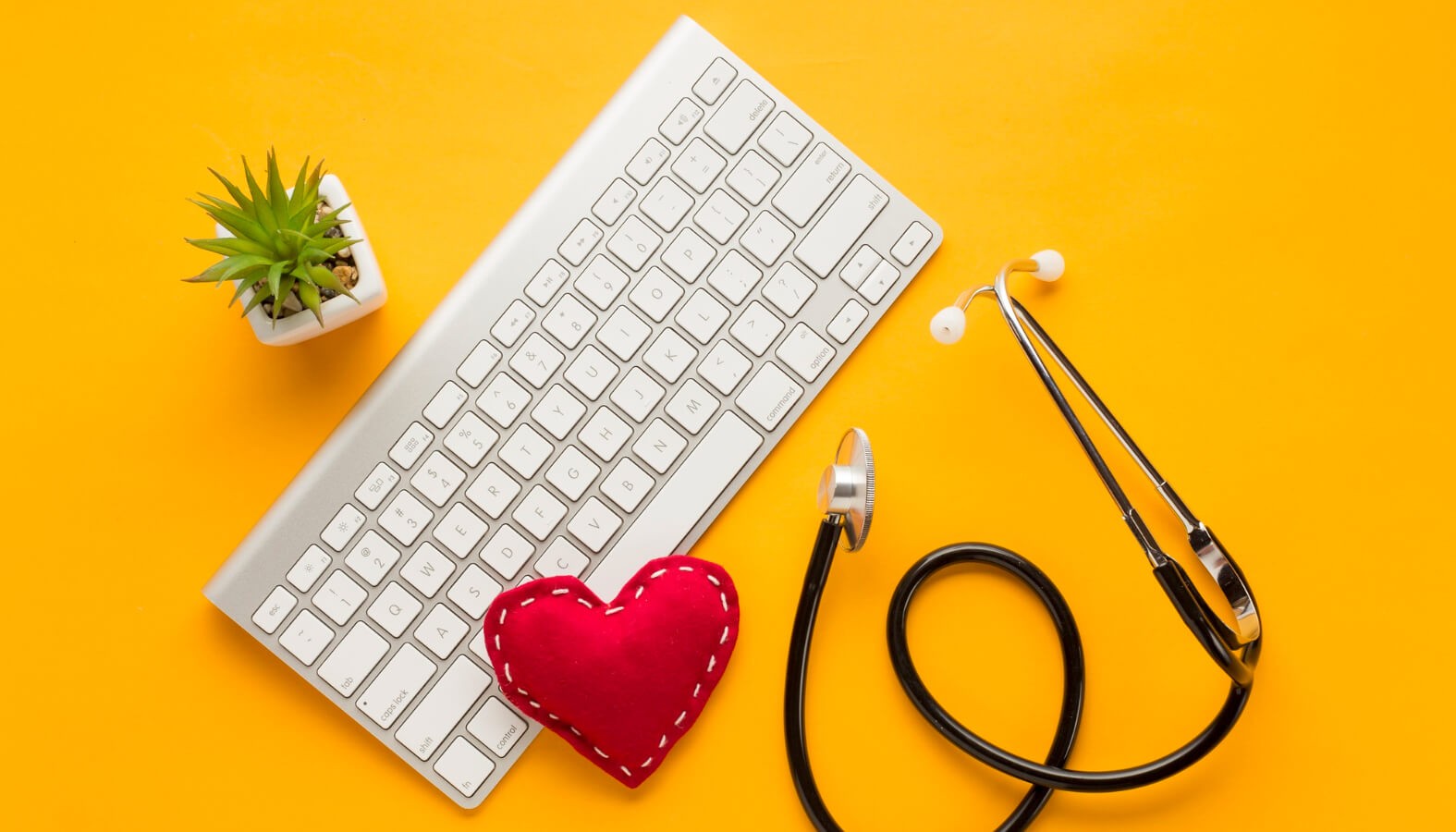 laptop heart stethoscope checking website health