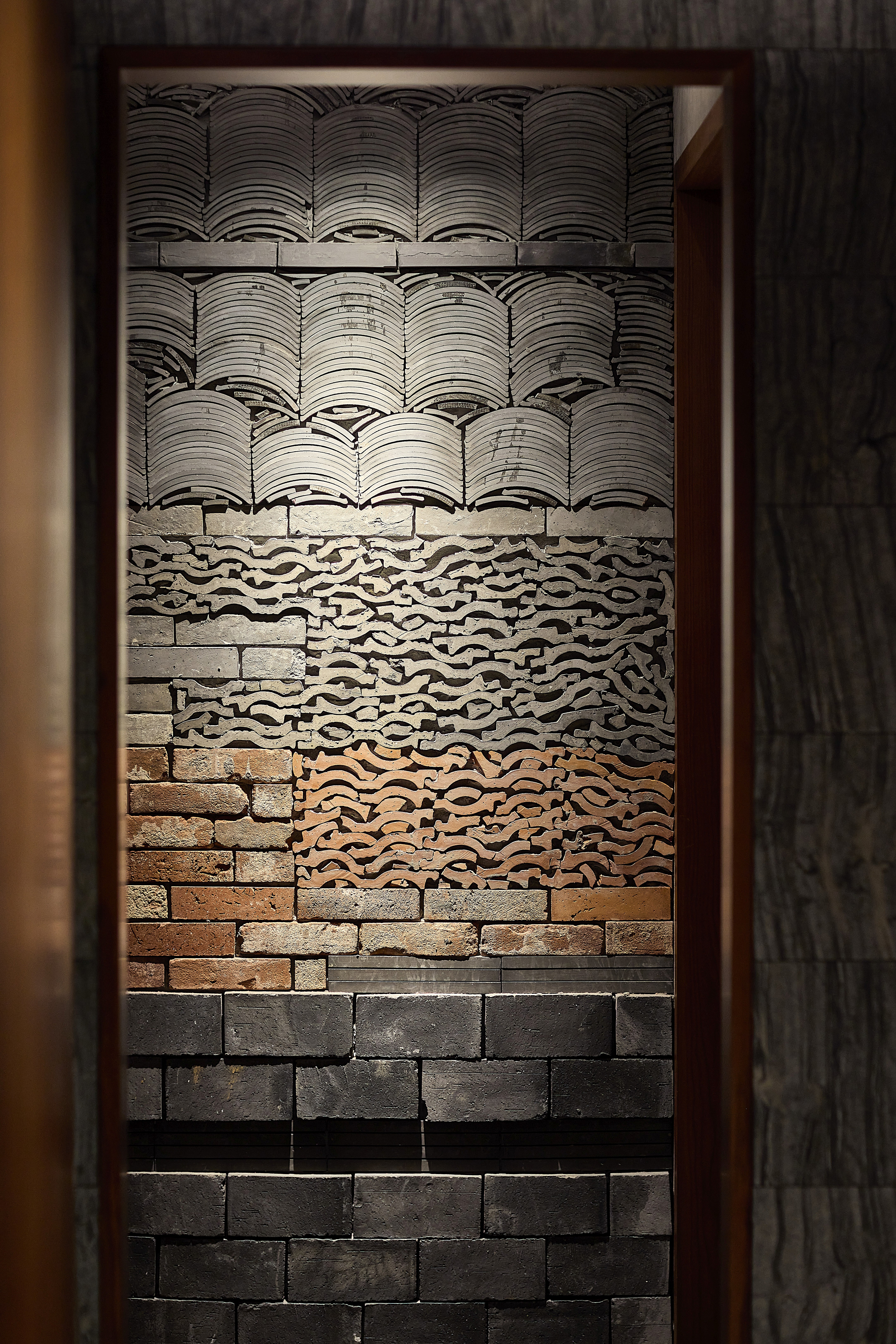 Stacked asian tiles composition wall  detail