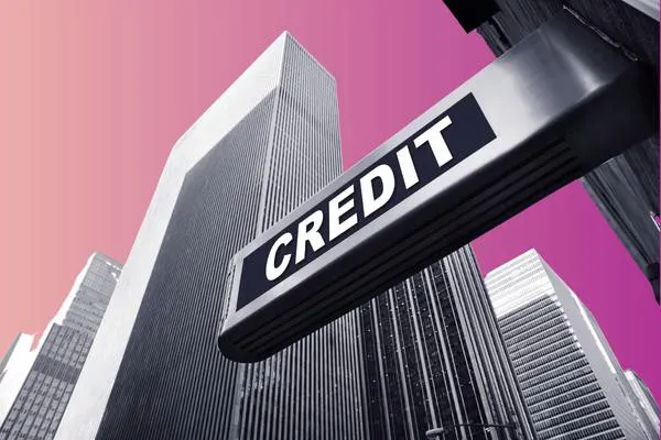 High-rise buildings with a sign that says "CREDIT"