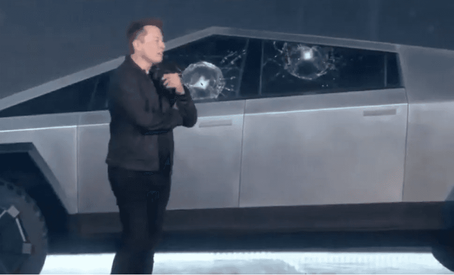 A person standing next to a car

AI-generated content may be incorrect.